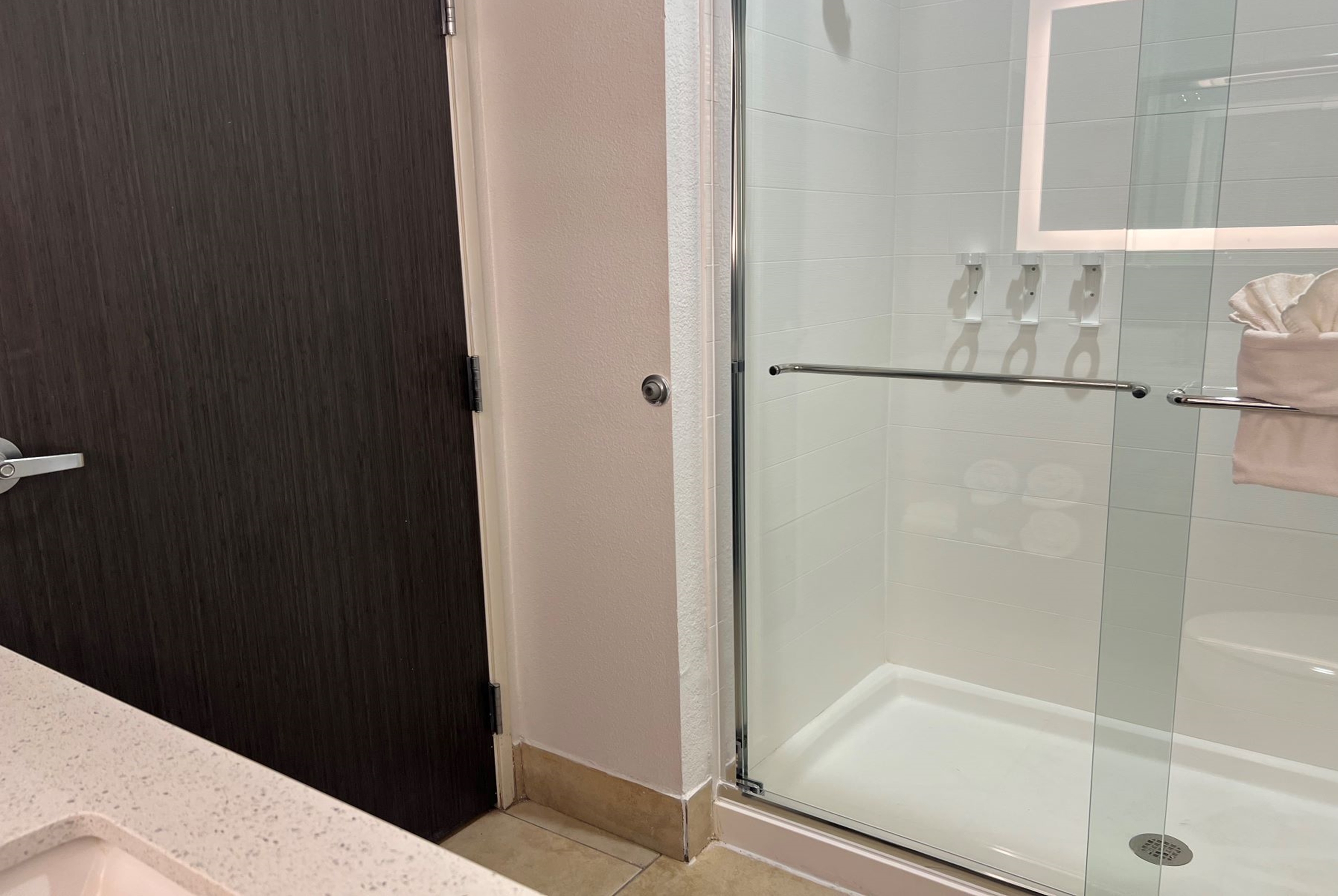 Guest room bath at the La Quinta Inn & Suites by Wyndham Dalhart in Dalhart, Texas