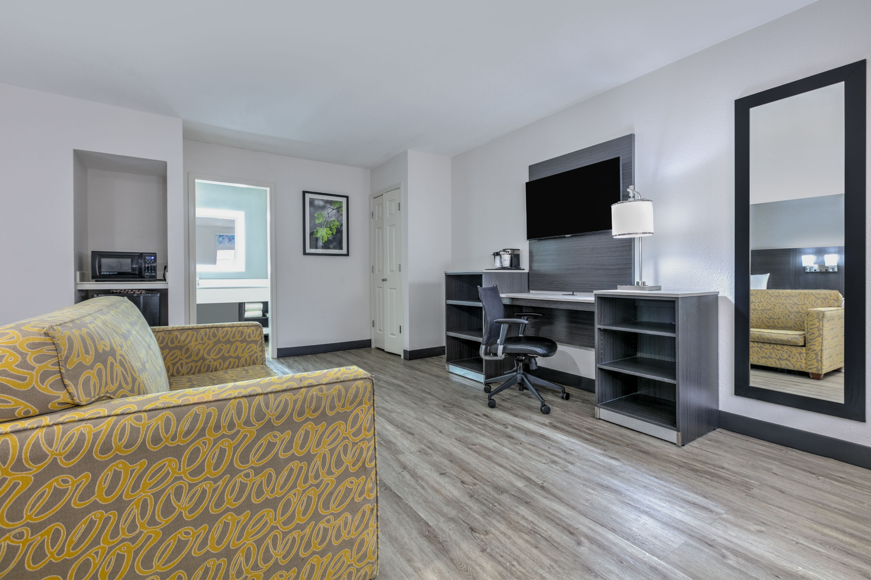 Guest room at the La Quinta Inn by Wyndham Dallas Uptown in Dallas, Texas