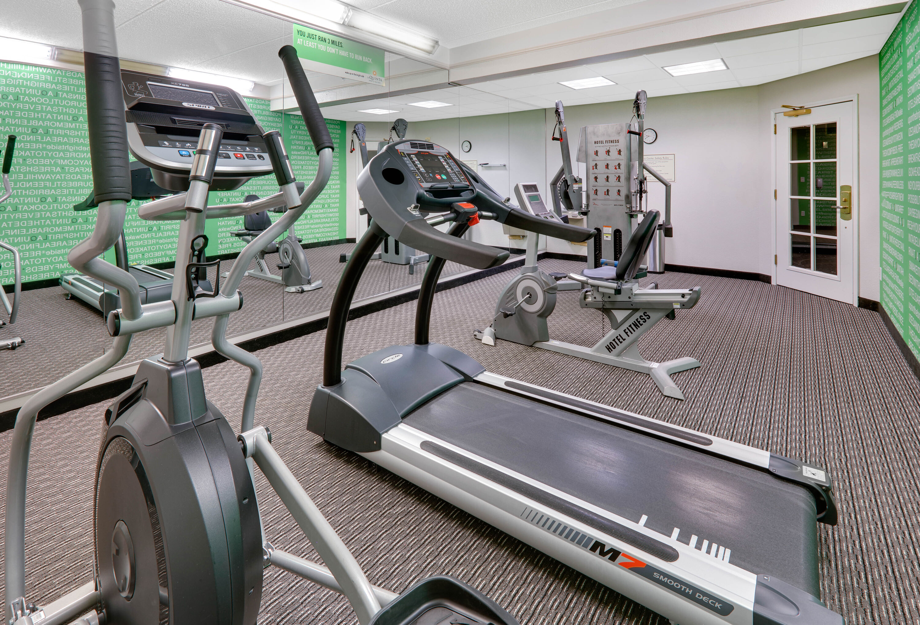 Fitness room at La Quinta Inn & Suites by Wyndham Dallas North Central in Dallas, Texas
