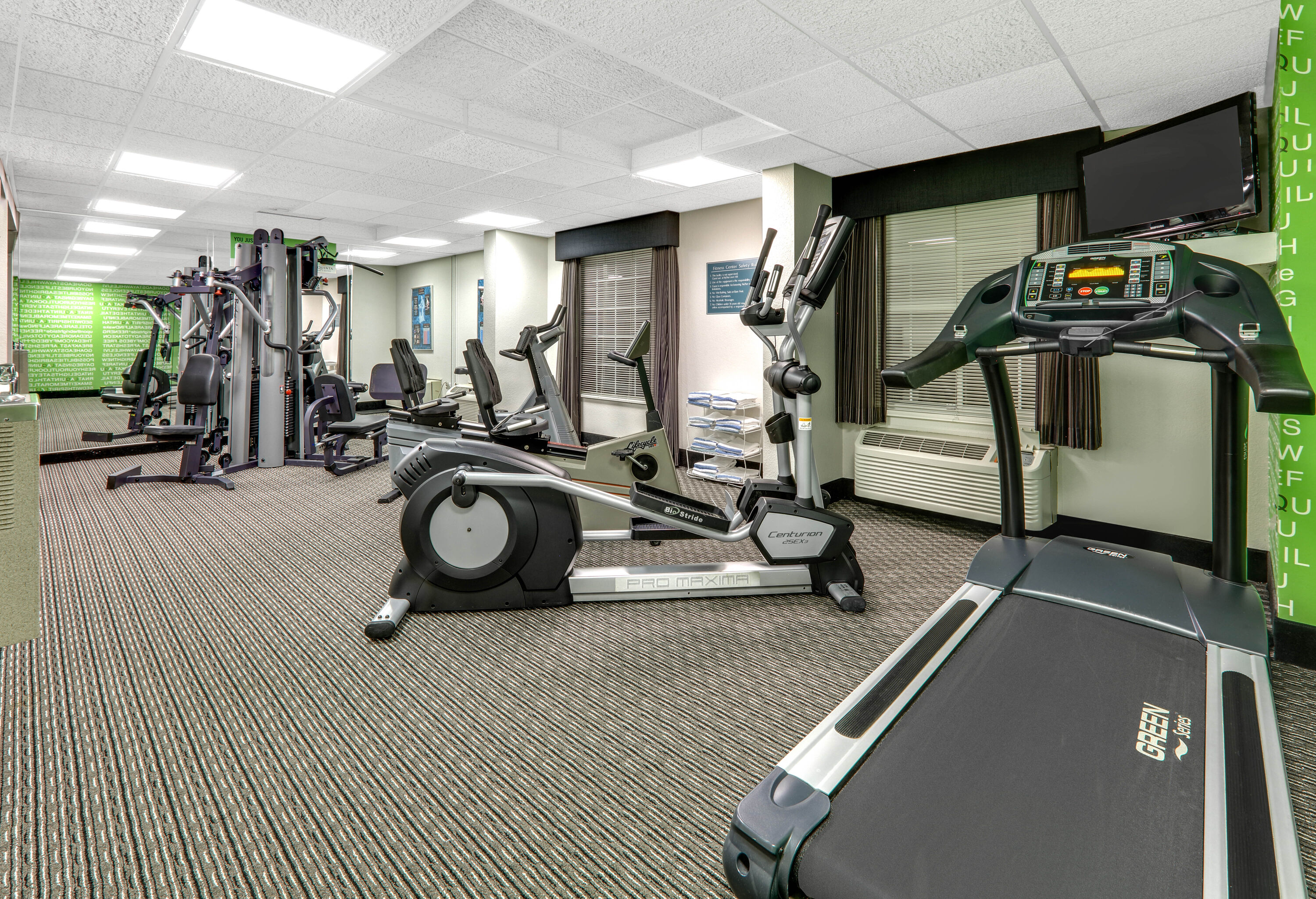 Fitness room at La Quinta Inn & Suites by Wyndham Dallas - Addison Galleria in Dallas, Texas