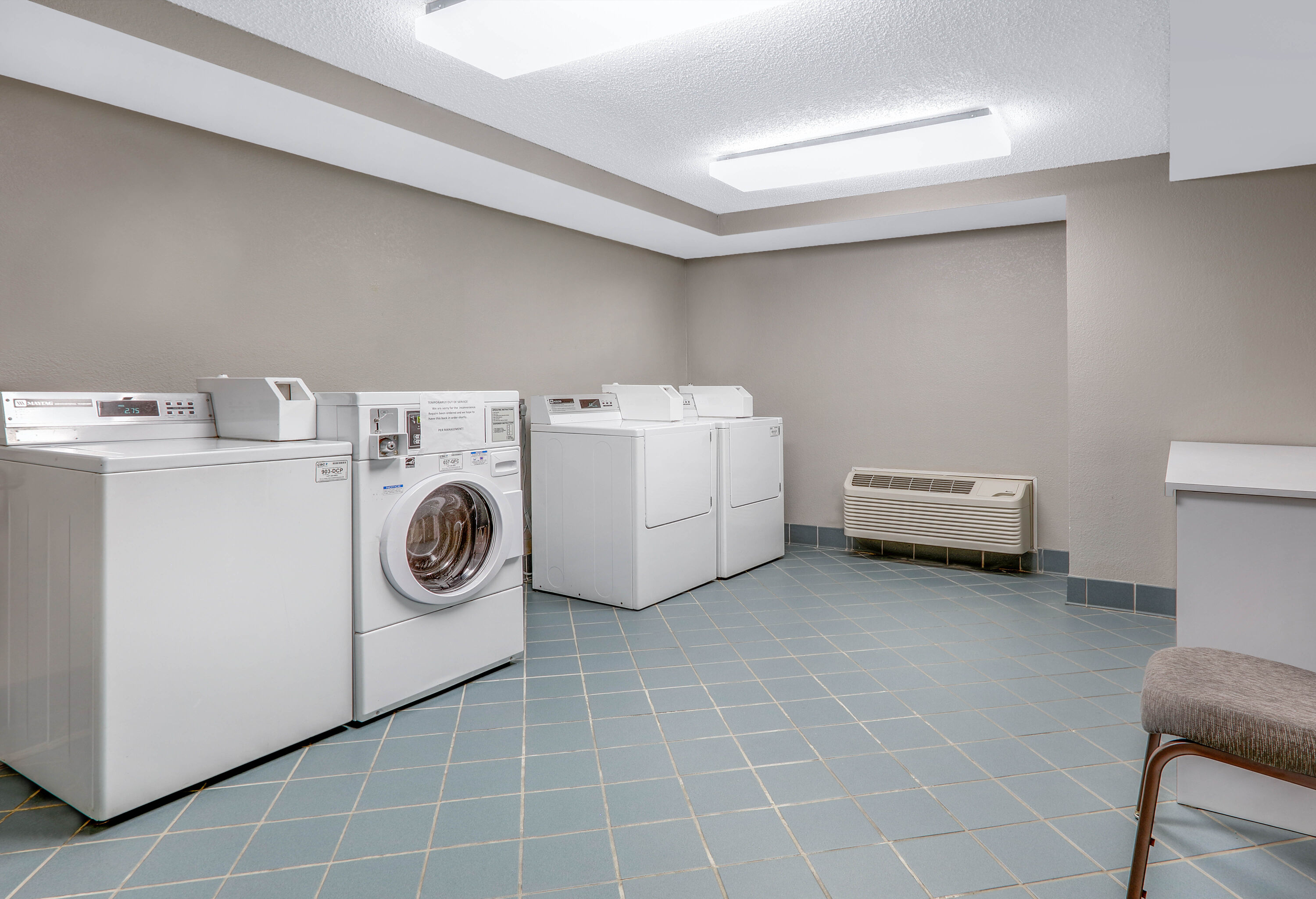 Laundry facilities at La Quinta Inn & Suites by Wyndham Dallas - Addison Galleria in Dallas, Texas
