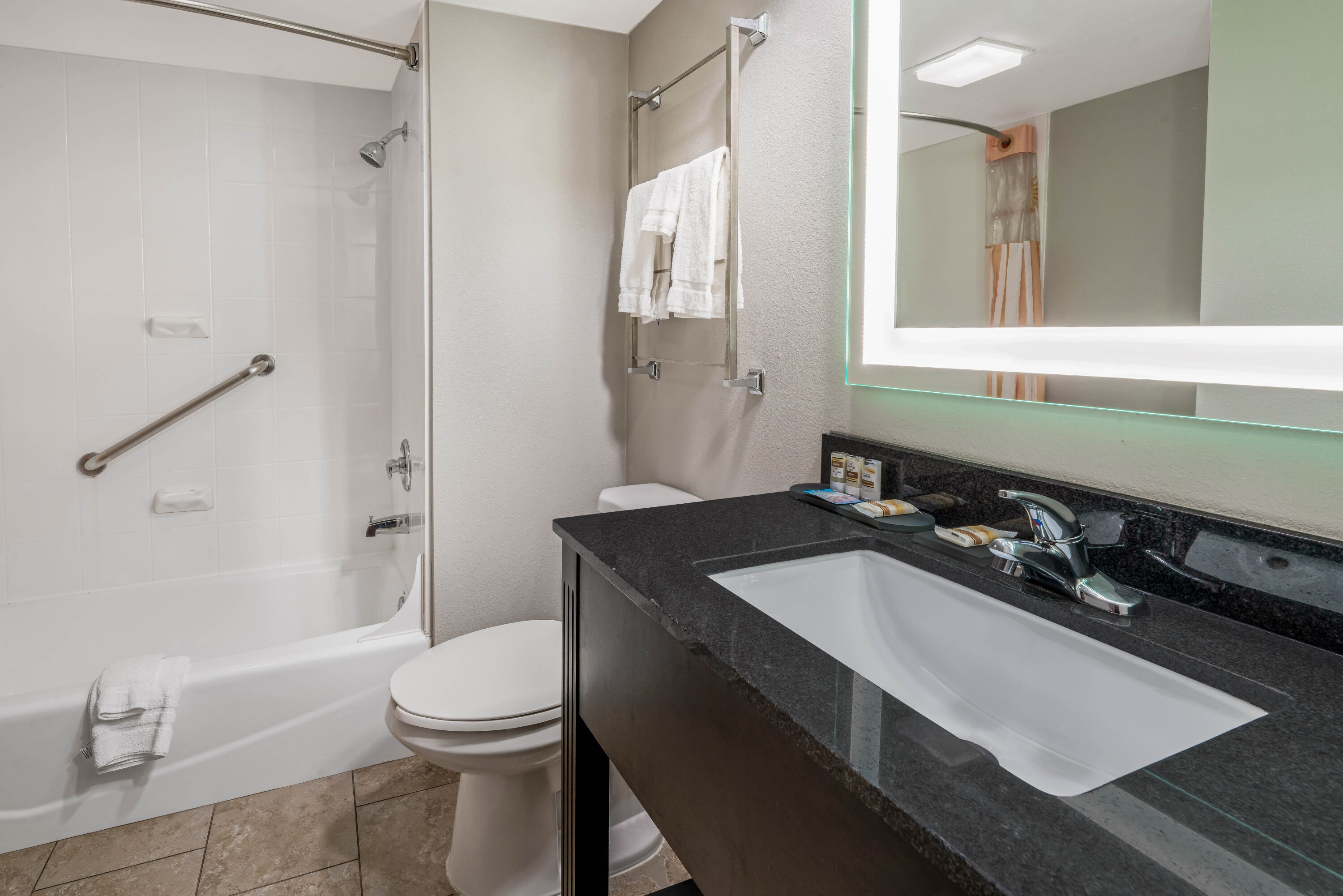 Guest room bath at the La Quinta Inn & Suites by Wyndham Dallas I-35 Walnut Hill Ln in Dallas, Texas