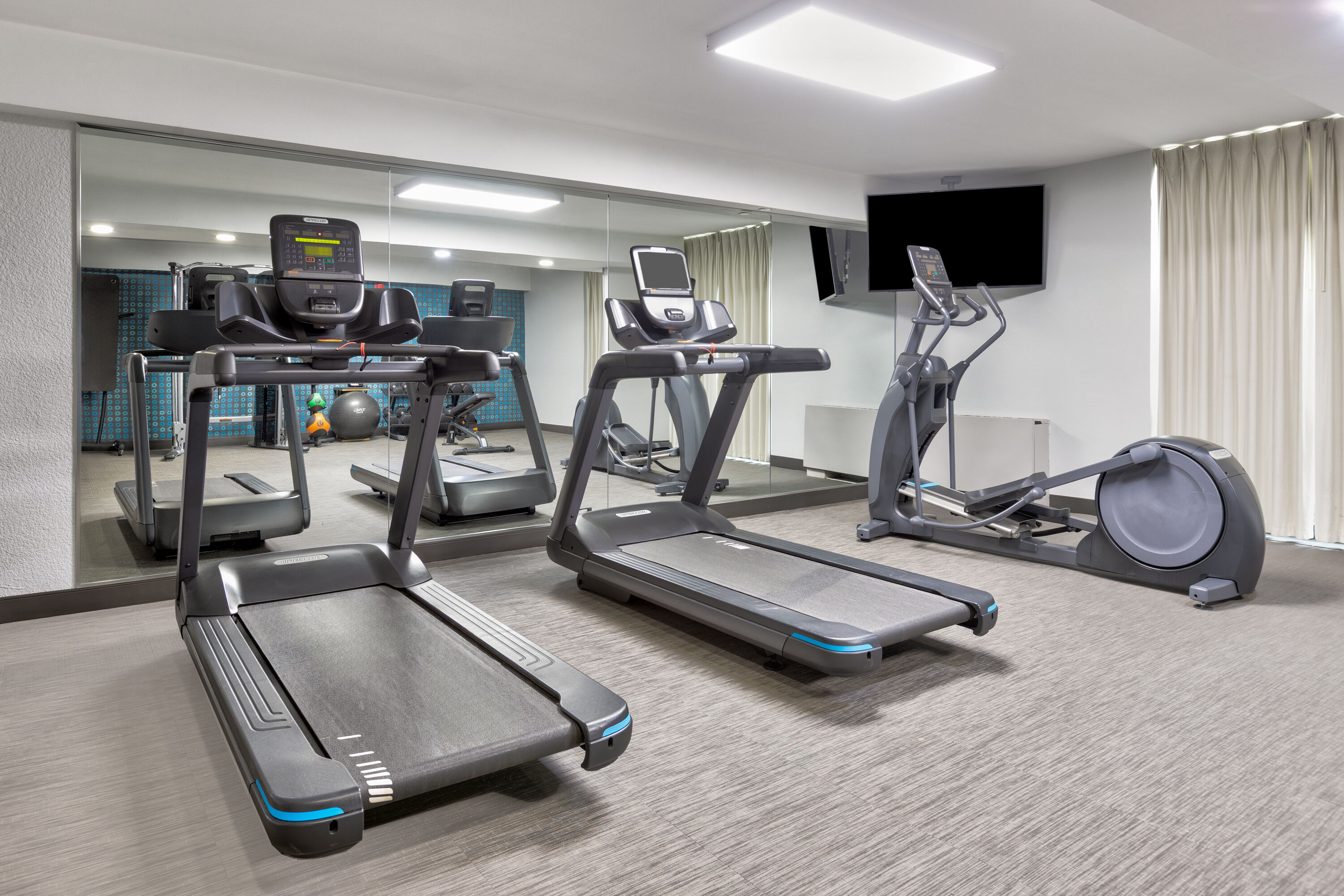 Fitness room at La Quinta Inn & Suites by Wyndham Dallas I-35 Walnut Hill Ln in Dallas, Texas