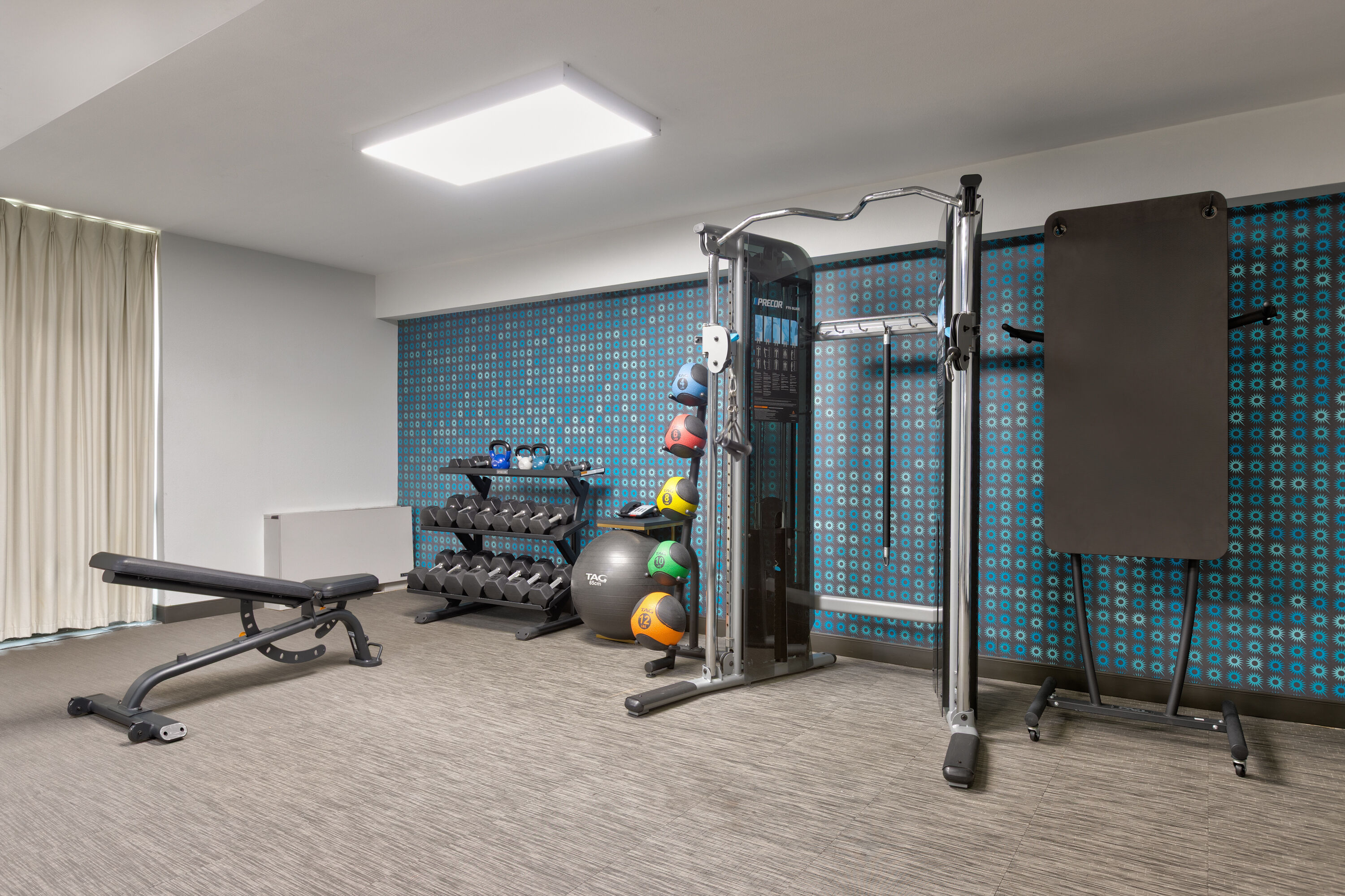 Fitness room at La Quinta Inn & Suites by Wyndham Dallas I-35 Walnut Hill Ln in Dallas, Texas