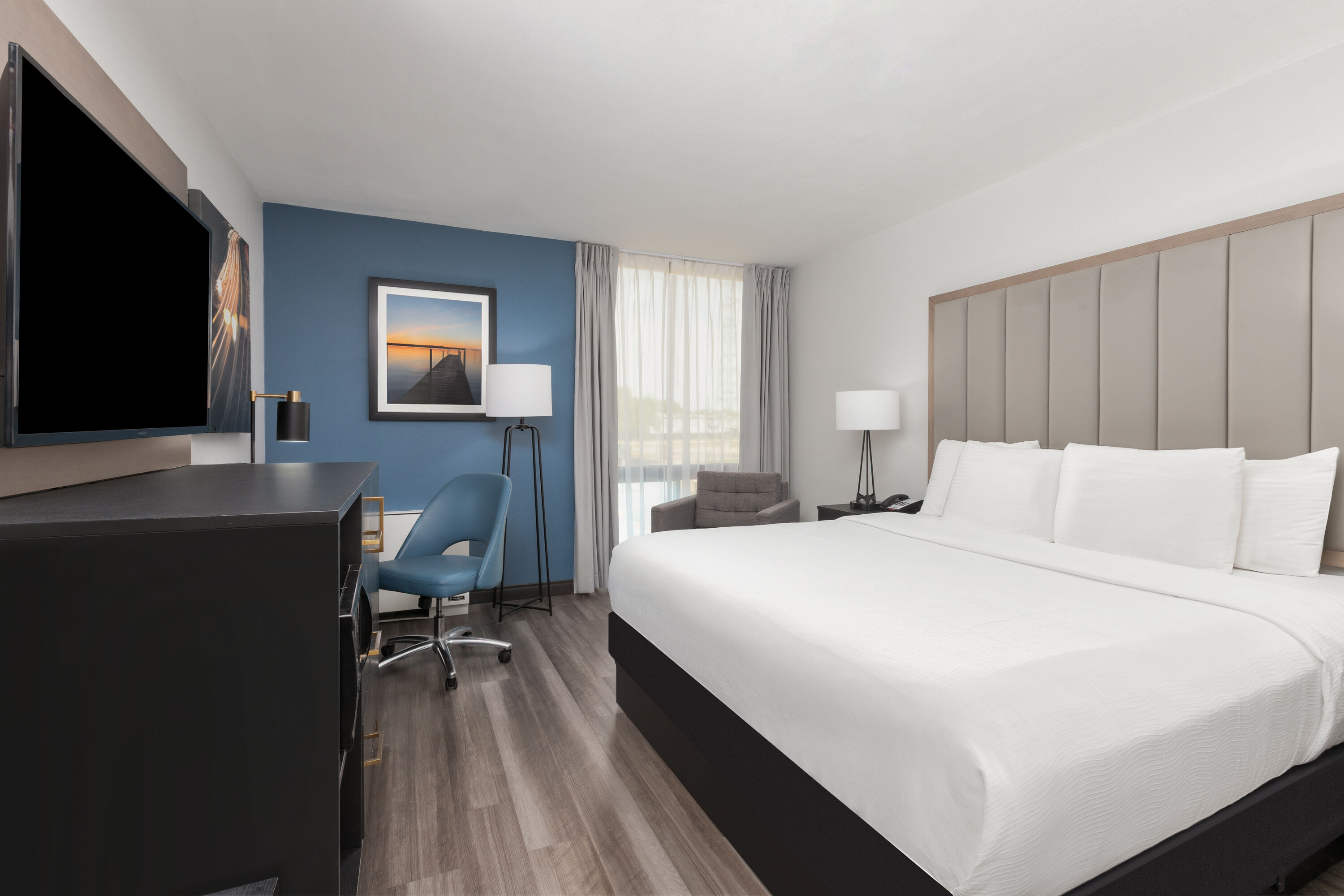 Guest room at the La Quinta Inn & Suites by Wyndham Dallas I-35 Walnut Hill Ln in Dallas, Texas