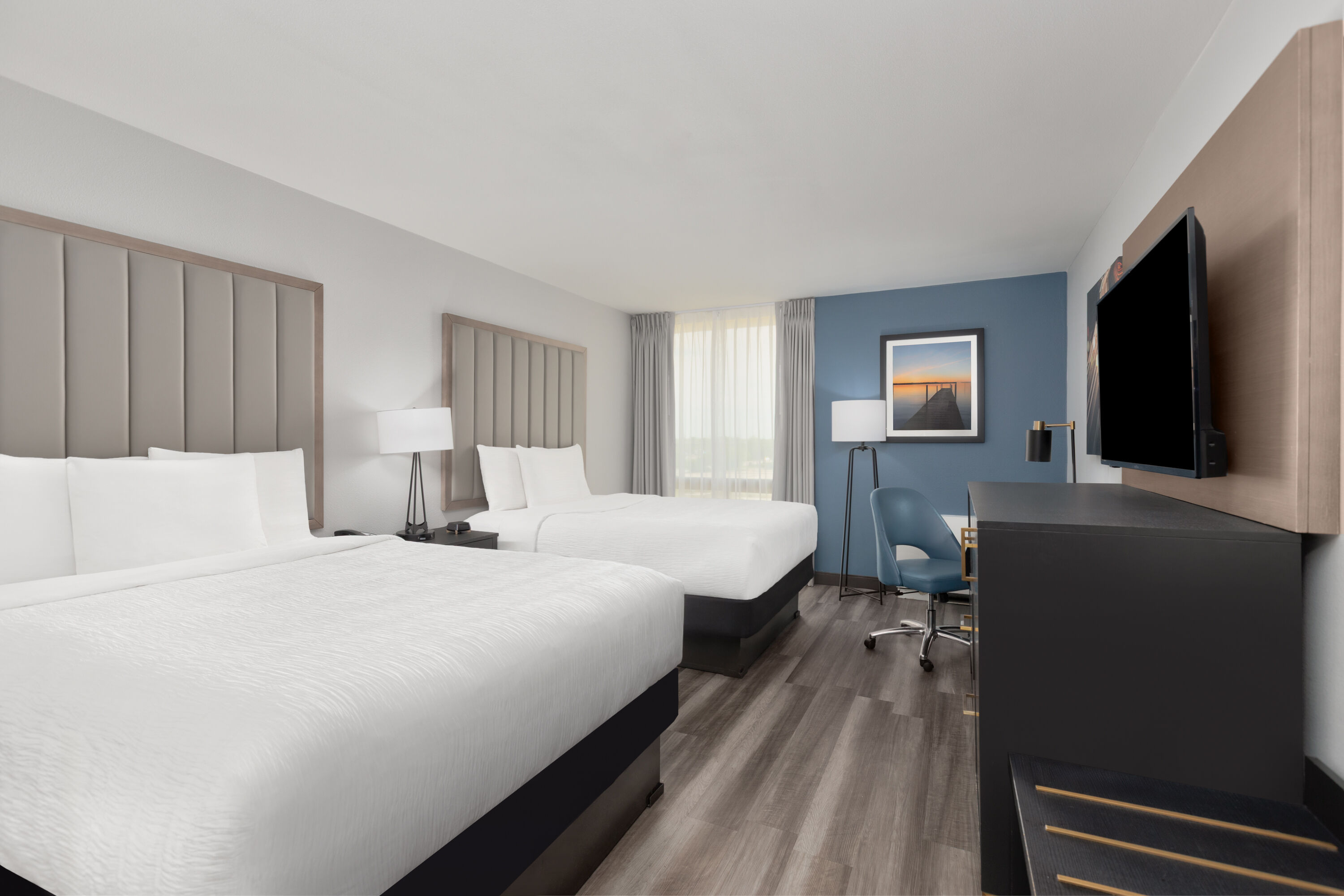 Guest room at the La Quinta Inn & Suites by Wyndham Dallas I-35 Walnut Hill Ln in Dallas, Texas