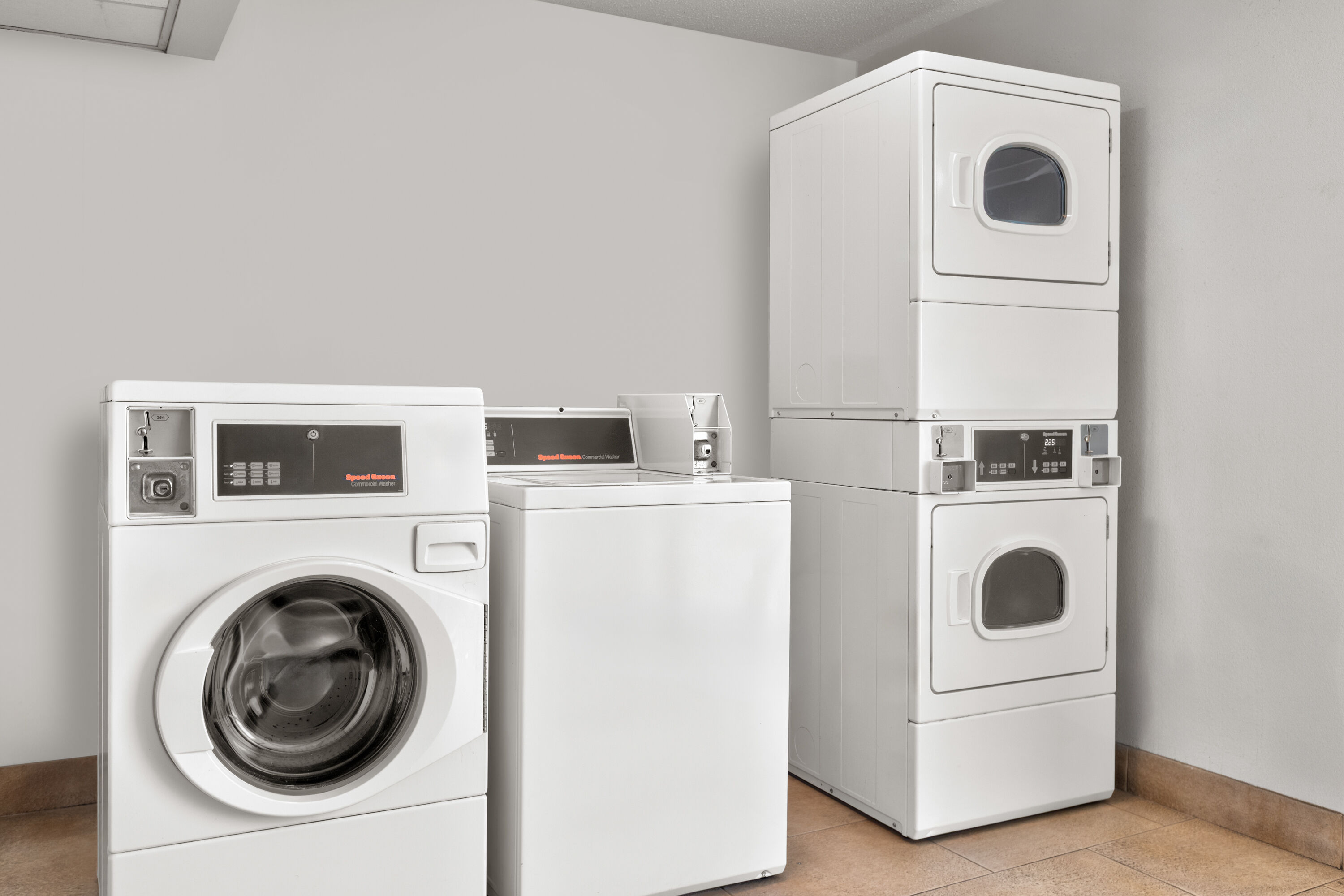 Laundry facilities at La Quinta Inn & Suites by Wyndham Dallas I-35 Walnut Hill Ln in Dallas, Texas