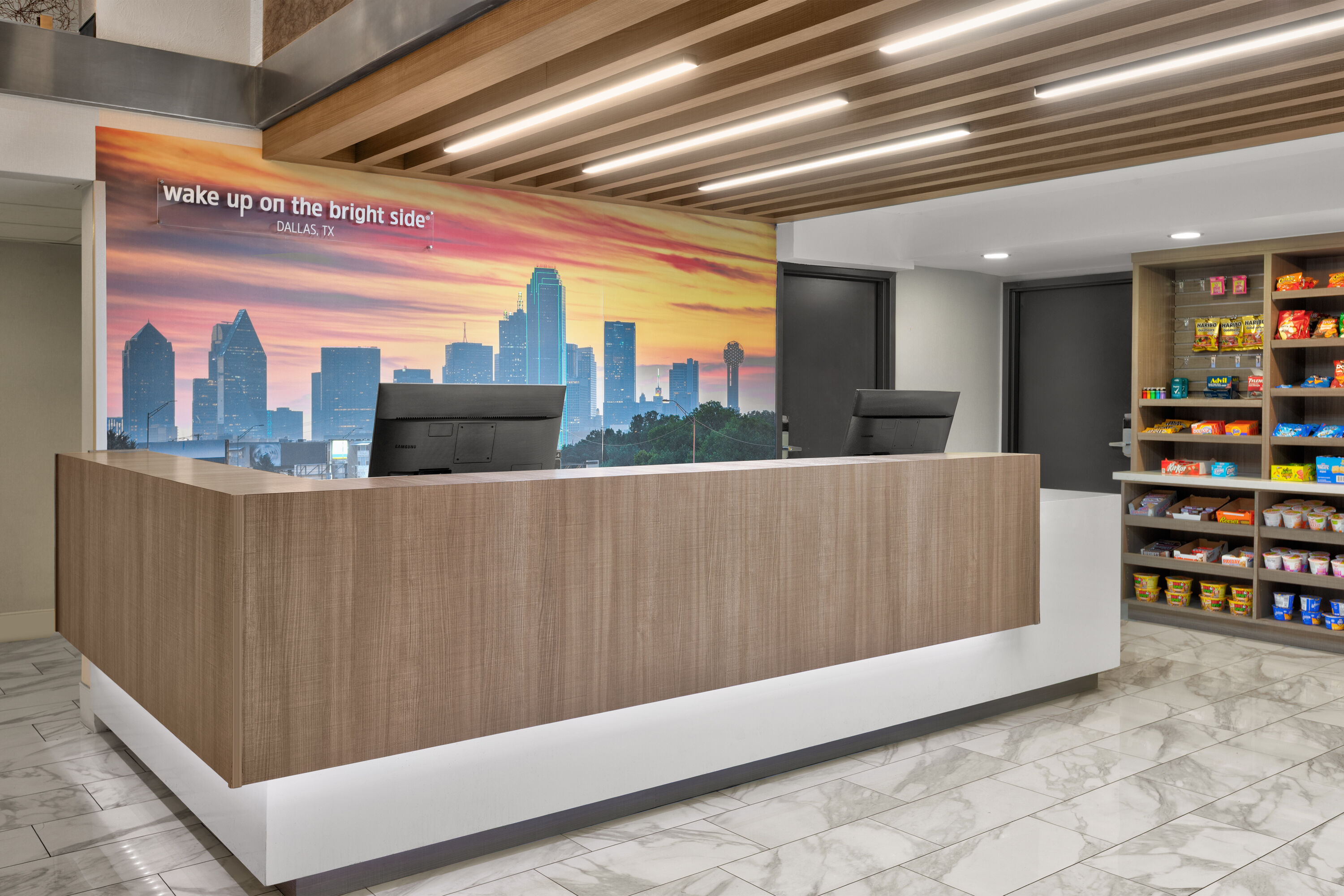 La Quinta Inn & Suites by Wyndham Dallas I-35 Walnut Hill Ln reception in Dallas, Texas