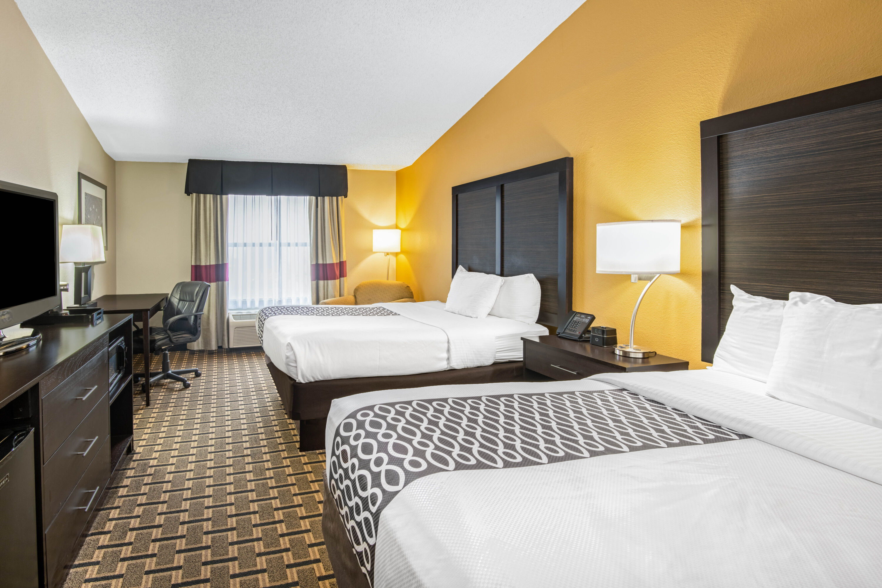 Guest room at the La Quinta Inn & Suites by Wyndham Denison - N. Lake Texoma in Denison, Texas