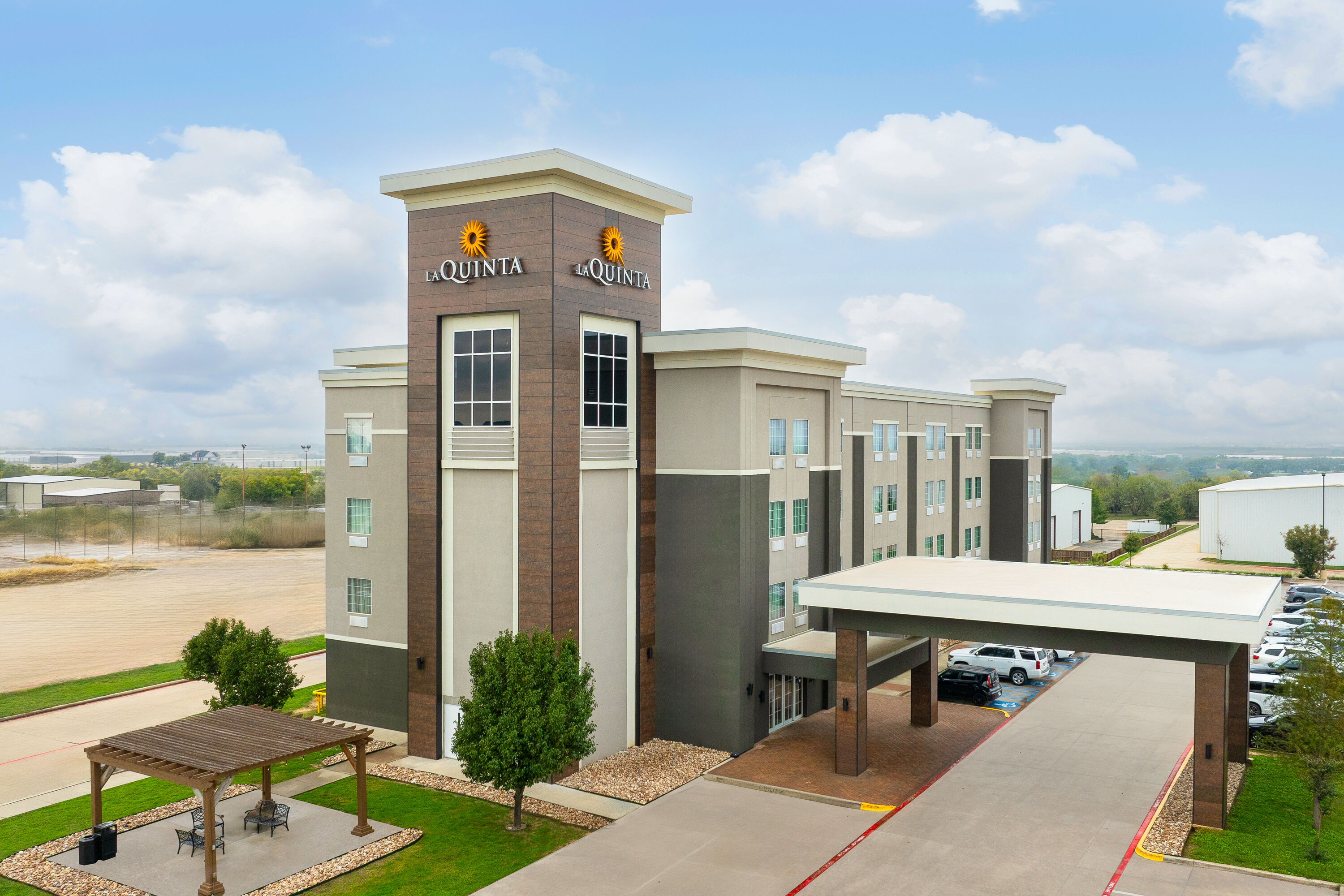 Aerial View of La Quinta Inn & Suites by Wyndham Denton - University Drive hotel in Denton, Texas