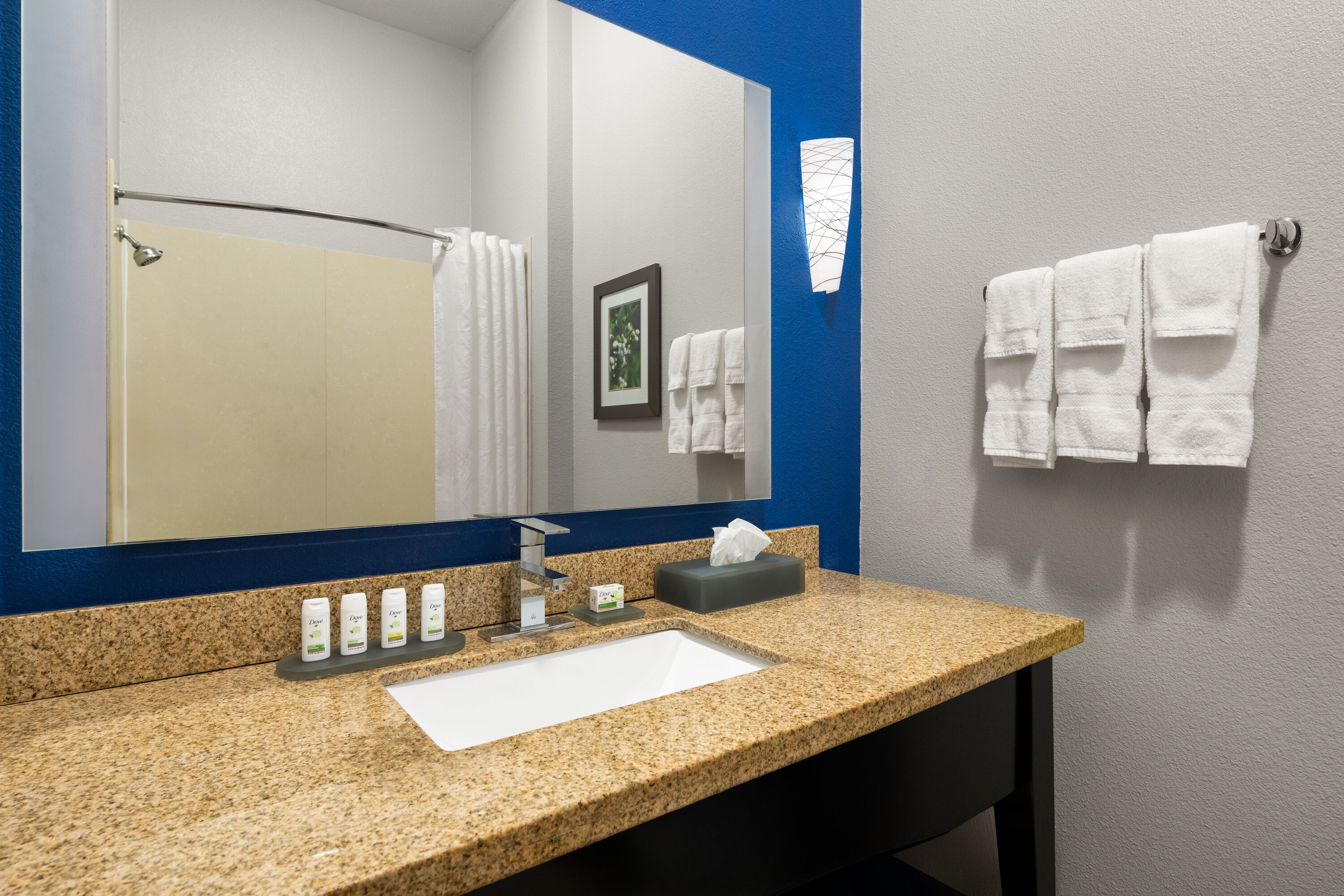 Guest room bath at the La Quinta Inn & Suites by Wyndham Denton - University Drive in Denton, Texas
