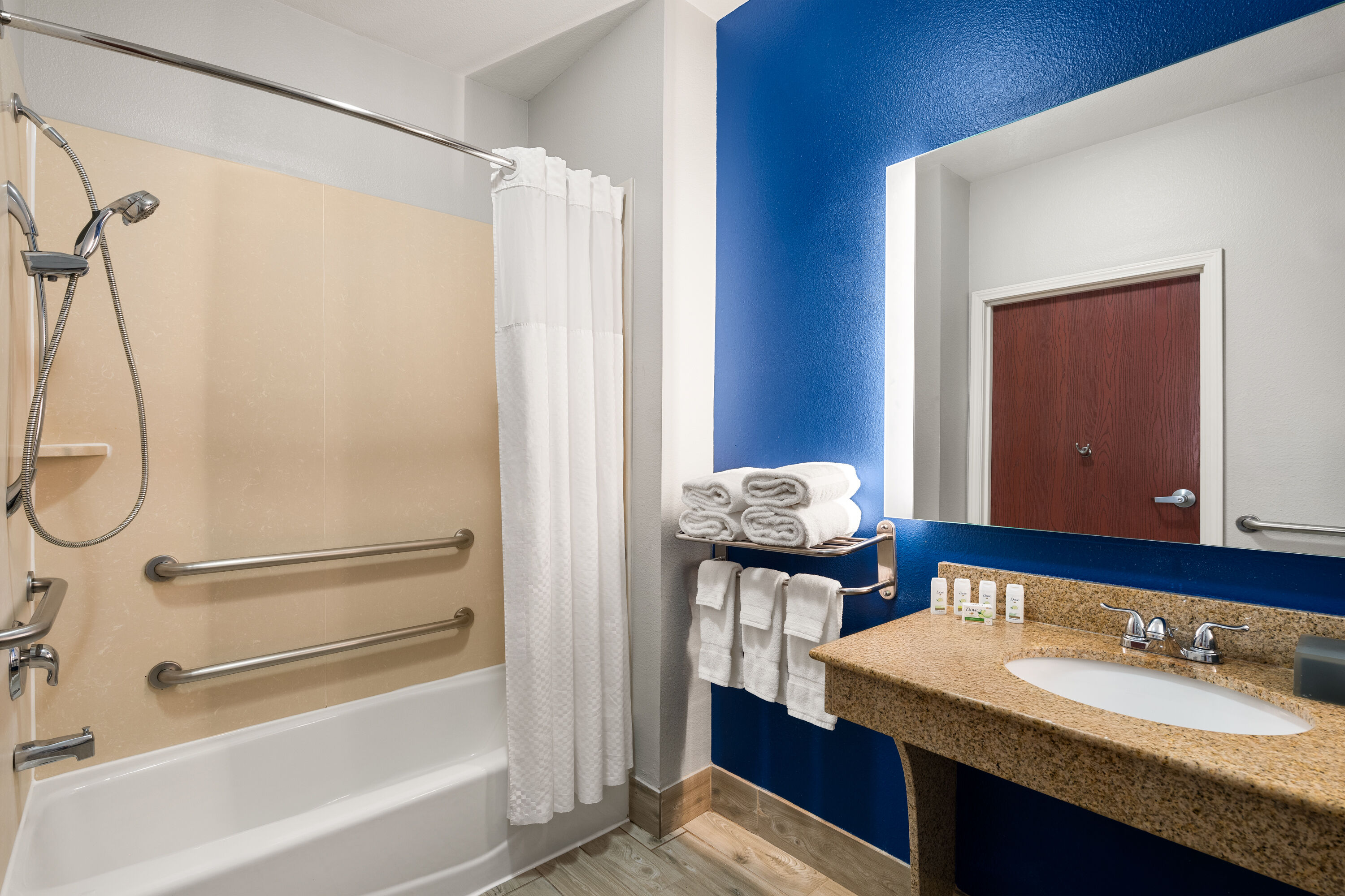 Guest room bath at the La Quinta Inn & Suites by Wyndham Denton - University Drive in Denton, Texas