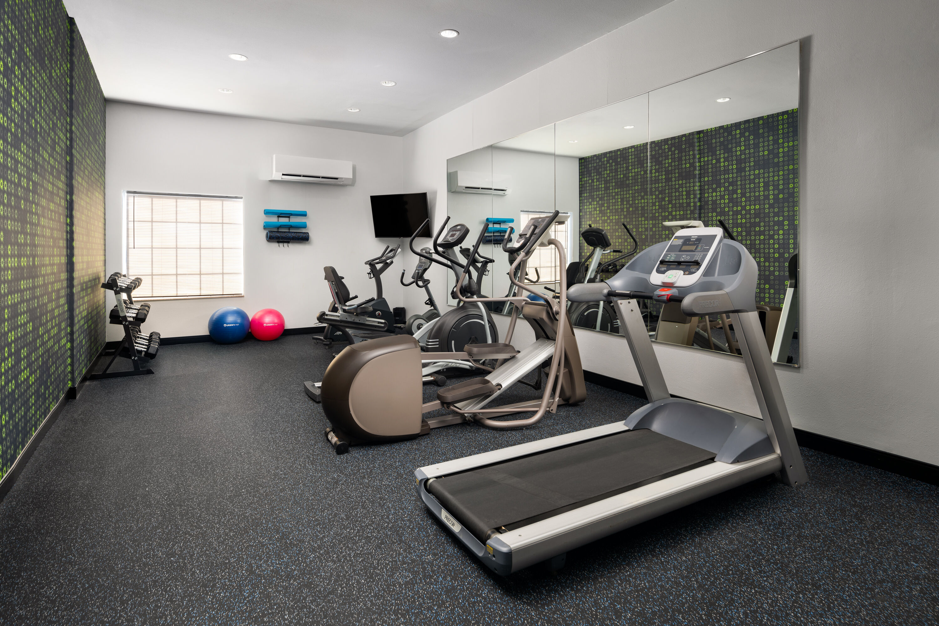 Fitness room at La Quinta Inn & Suites by Wyndham Denton - University Drive in Denton, Texas