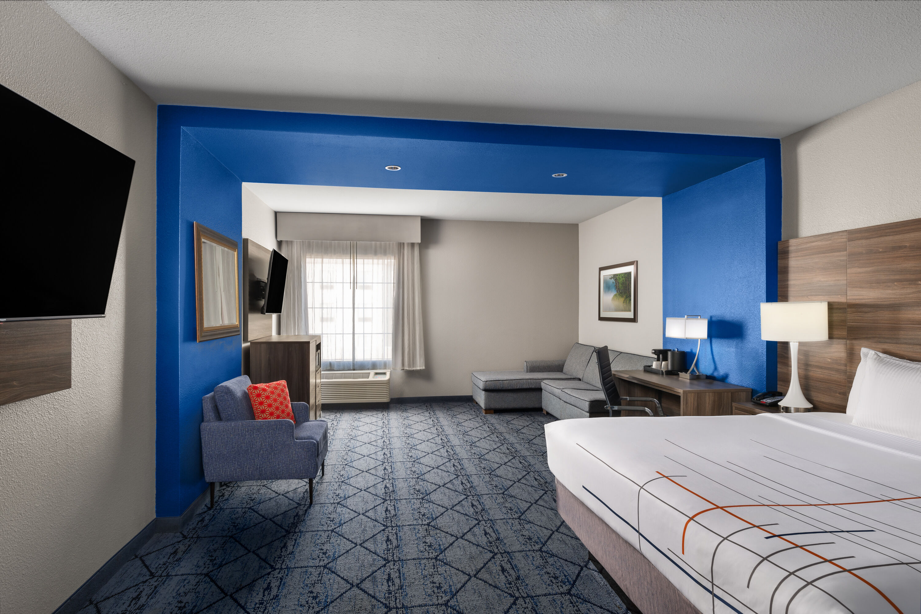 Guest room at the La Quinta Inn & Suites by Wyndham Denton - University Drive in Denton, Texas