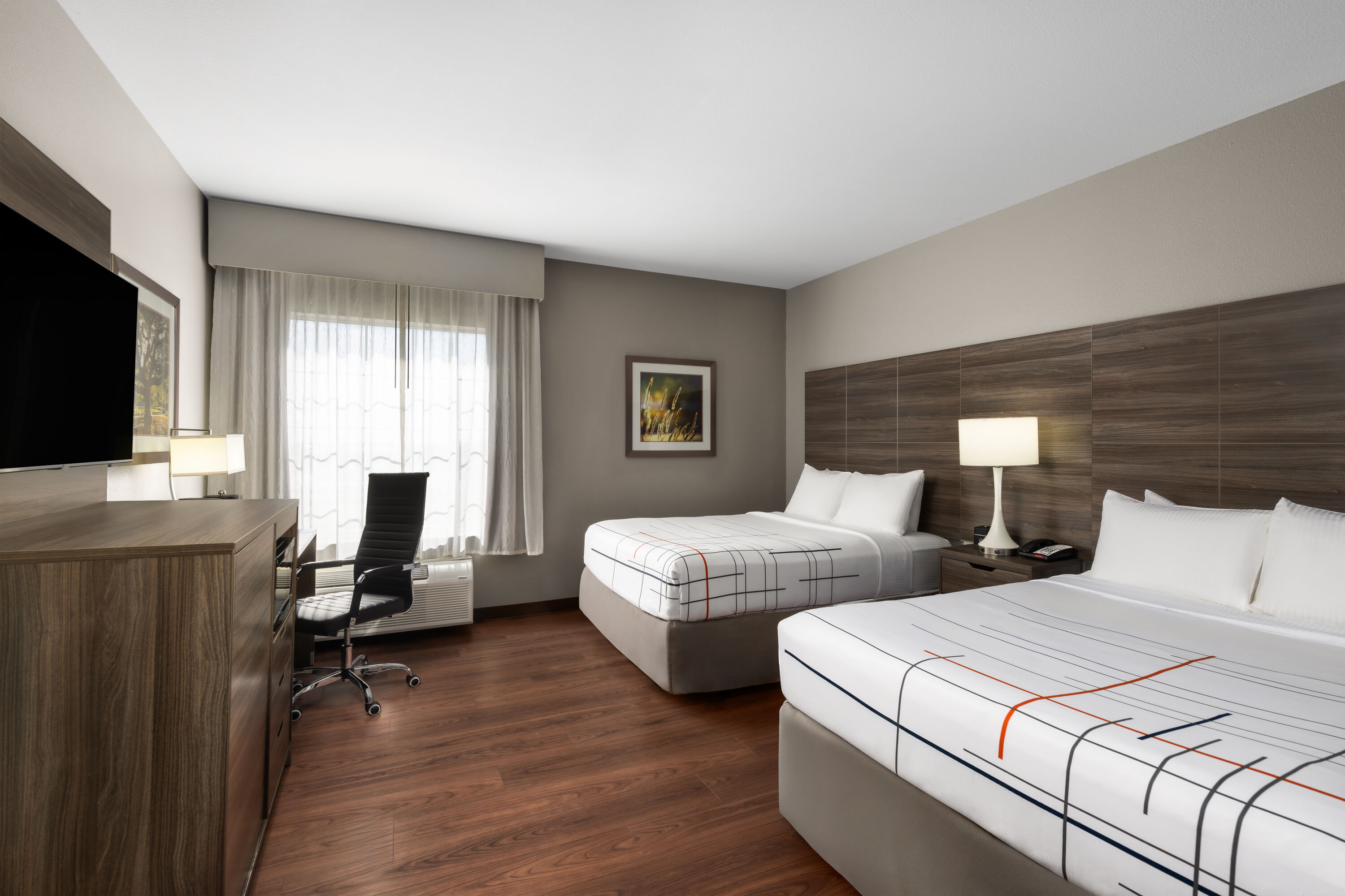 Guest room at the La Quinta Inn & Suites by Wyndham Denton - University Drive in Denton, Texas