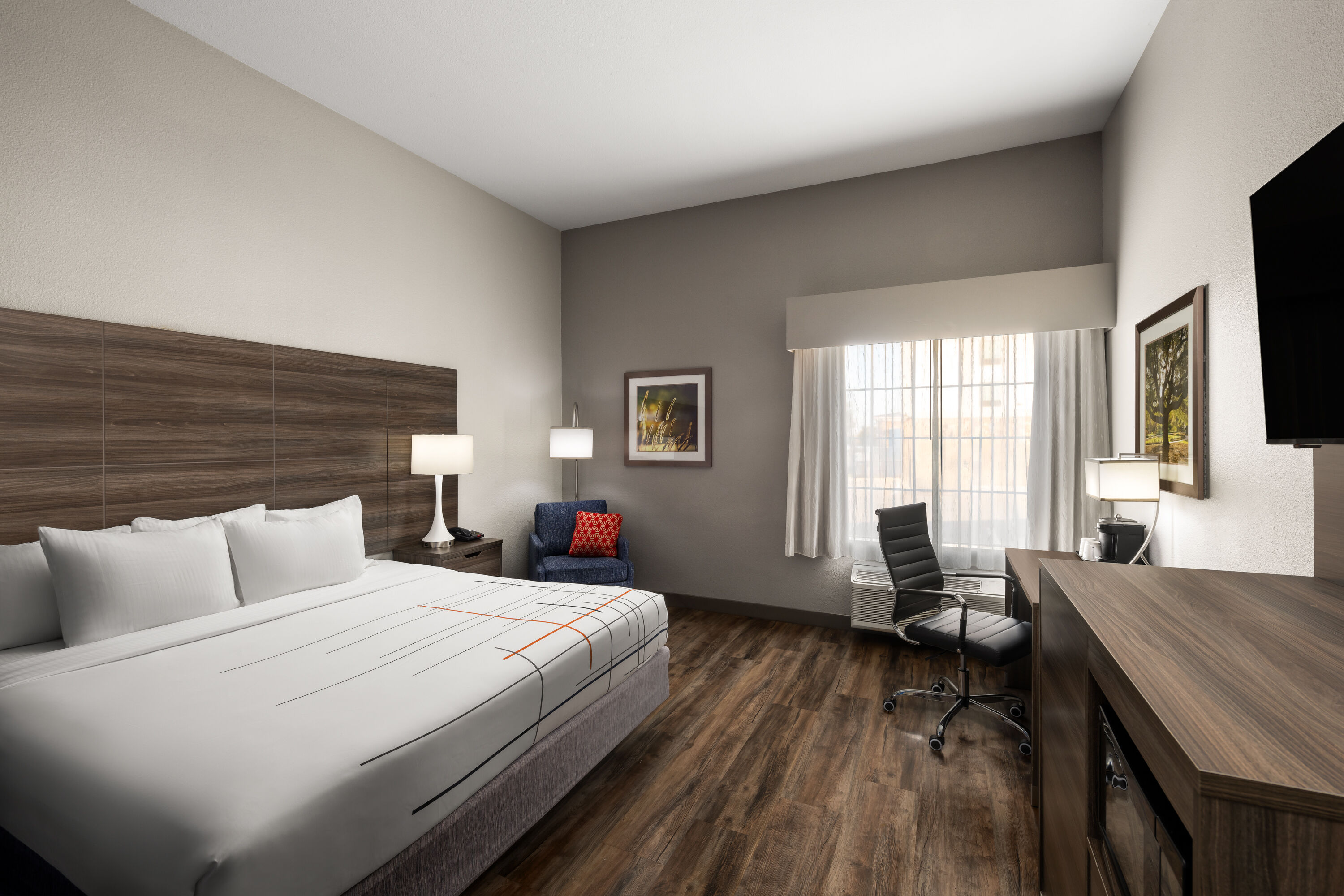 Guest room at the La Quinta Inn & Suites by Wyndham Denton - University Drive in Denton, Texas