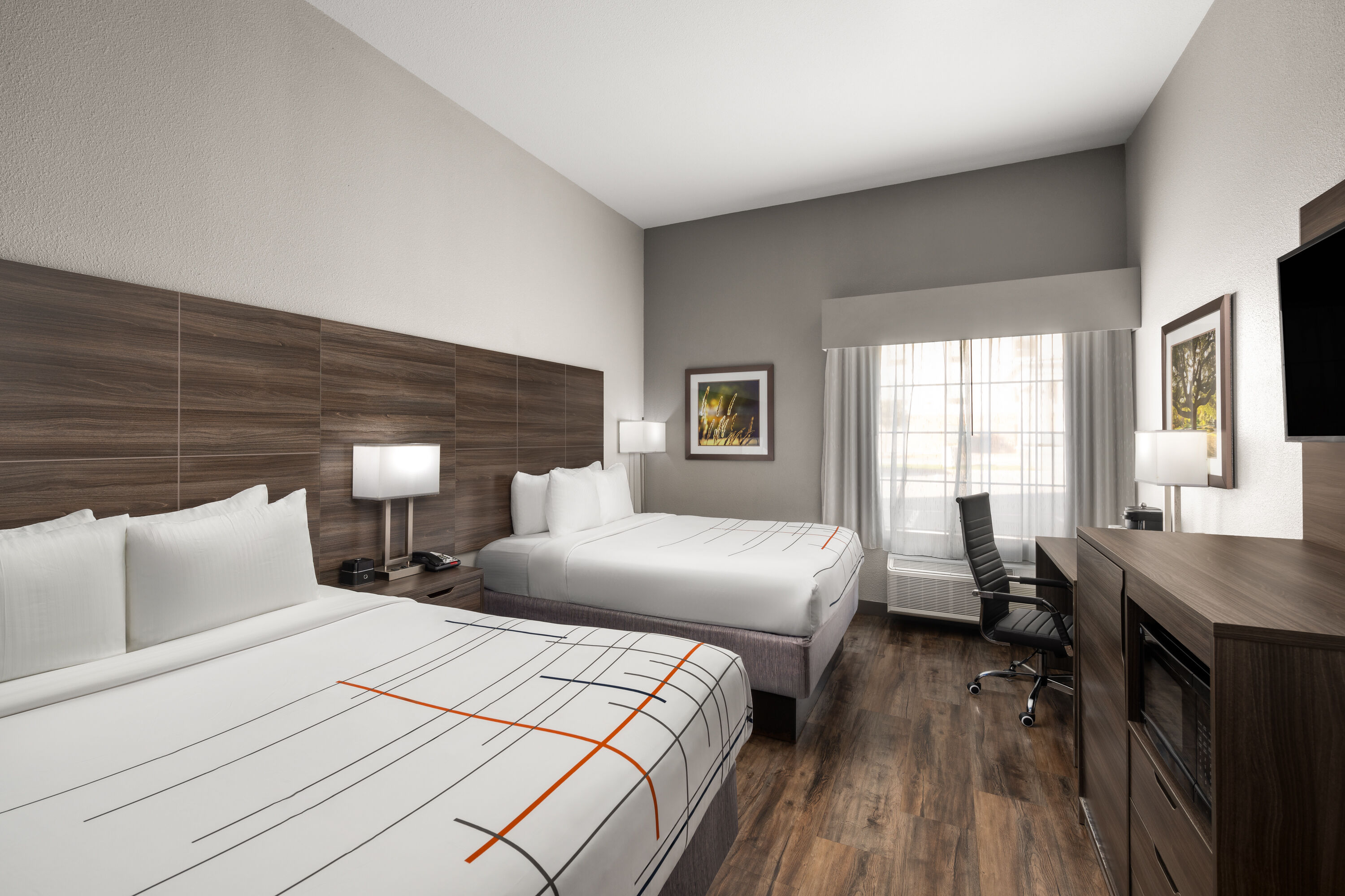 Guest room at the La Quinta Inn & Suites by Wyndham Denton - University Drive in Denton, Texas