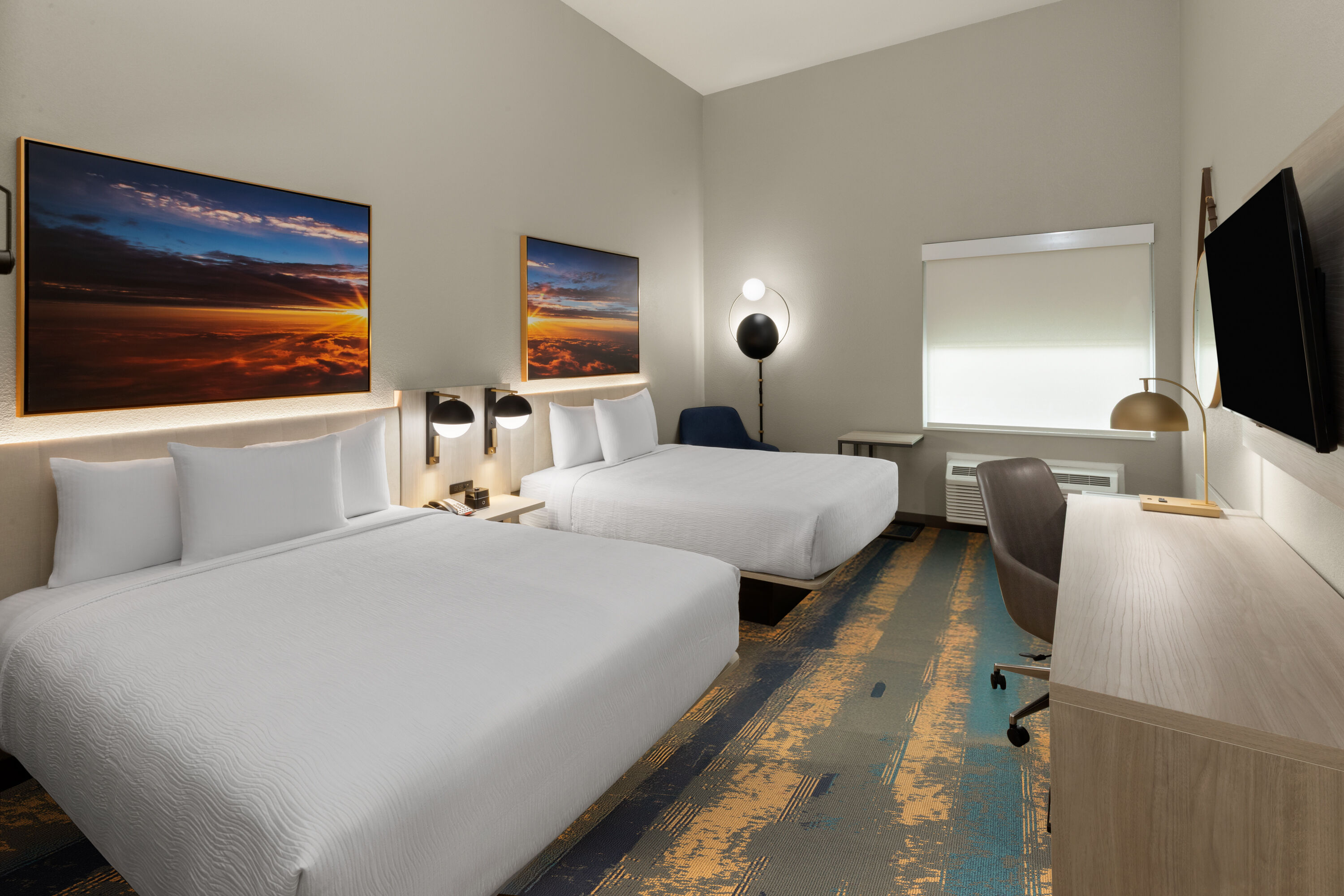 Guest room at the La Quinta Inn & Suites by Wyndham DeSoto in DeSoto, Texas