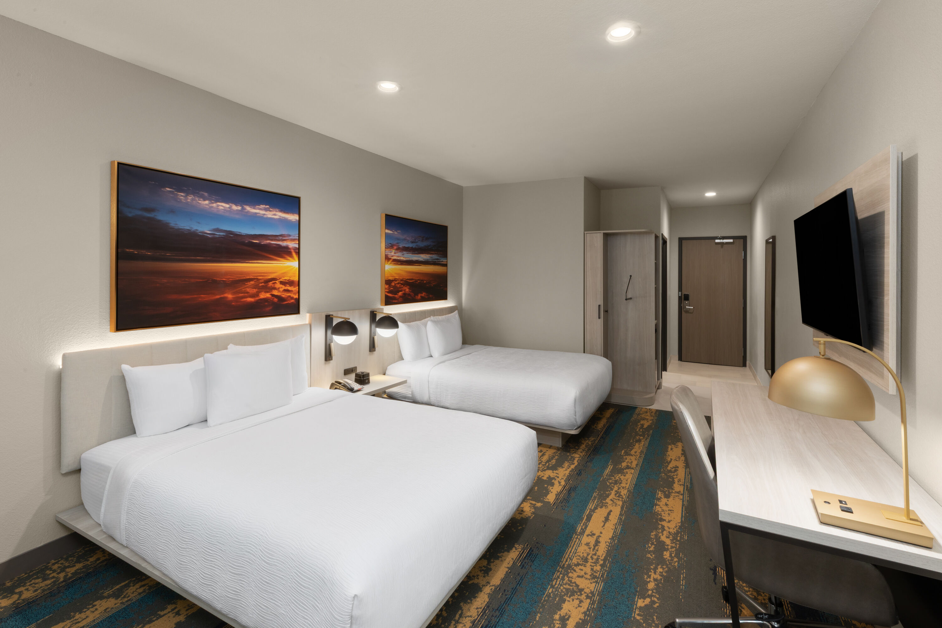 Guest room at the La Quinta Inn & Suites by Wyndham DeSoto in DeSoto, Texas