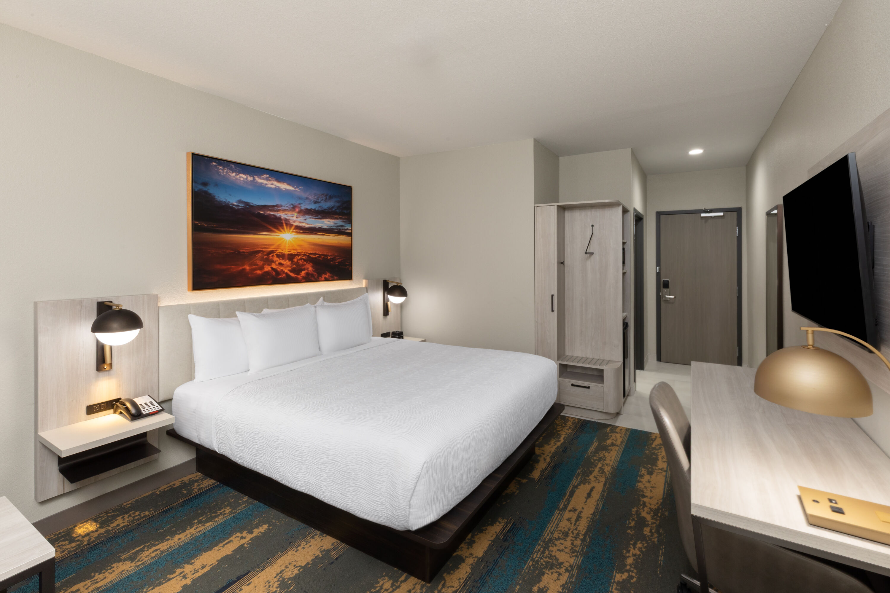 Guest room at the La Quinta Inn & Suites by Wyndham DeSoto in DeSoto, Texas