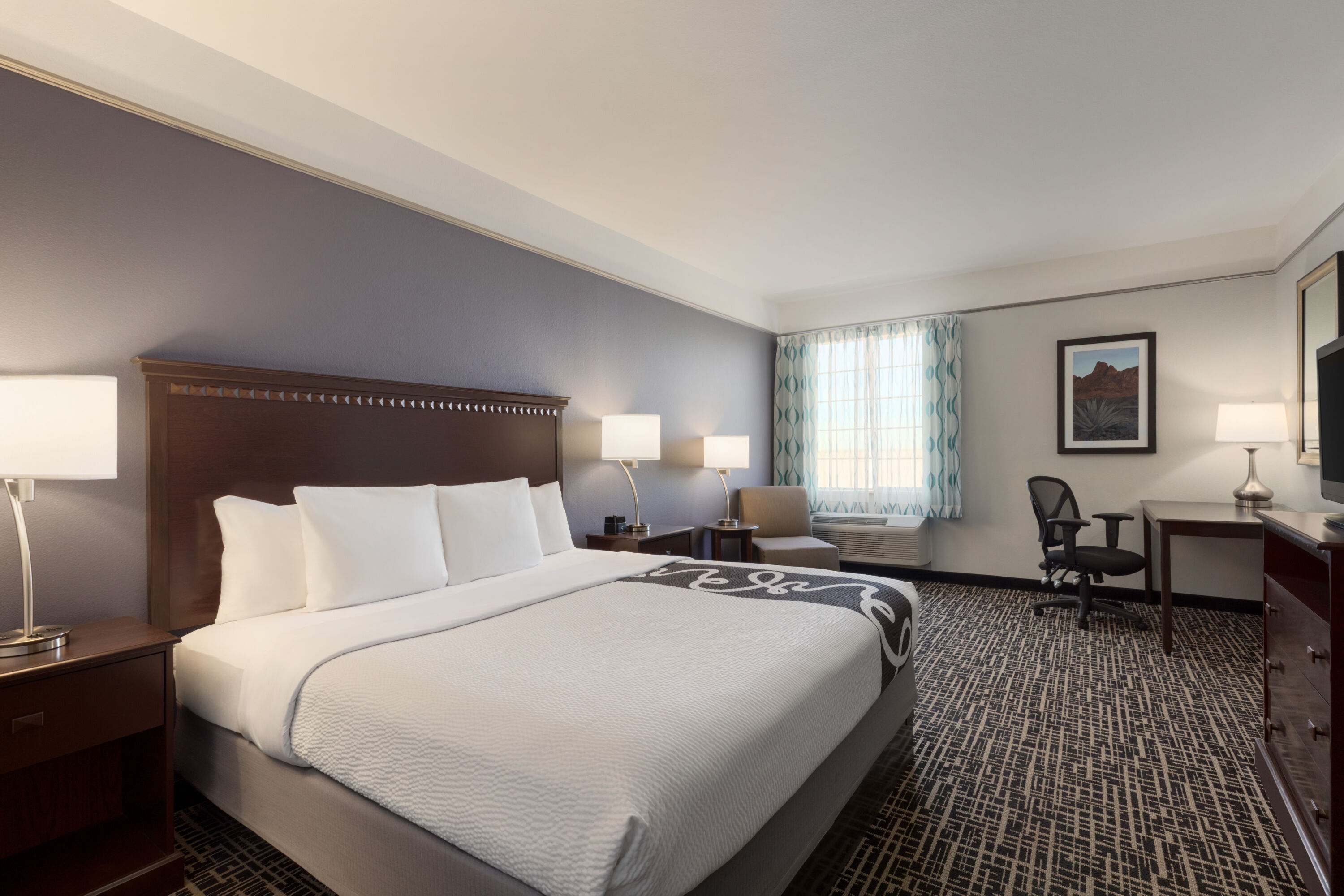 Guest room at the La Quinta Inn & Suites by Wyndham Dumas in Dumas, Texas