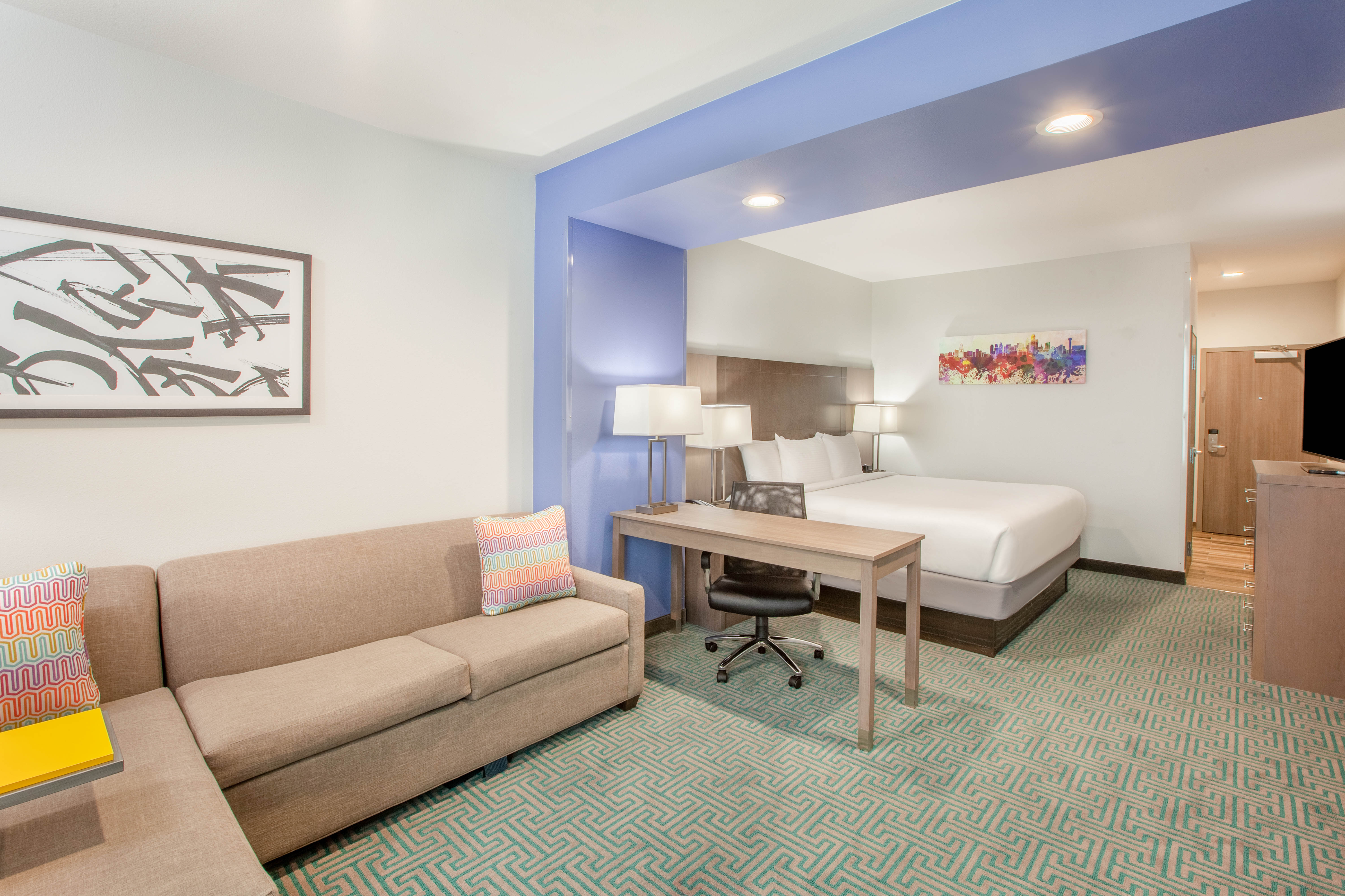 Guest room at the La Quinta Inn & Suites by Wyndham Dallas Duncanville in Duncanville, Texas