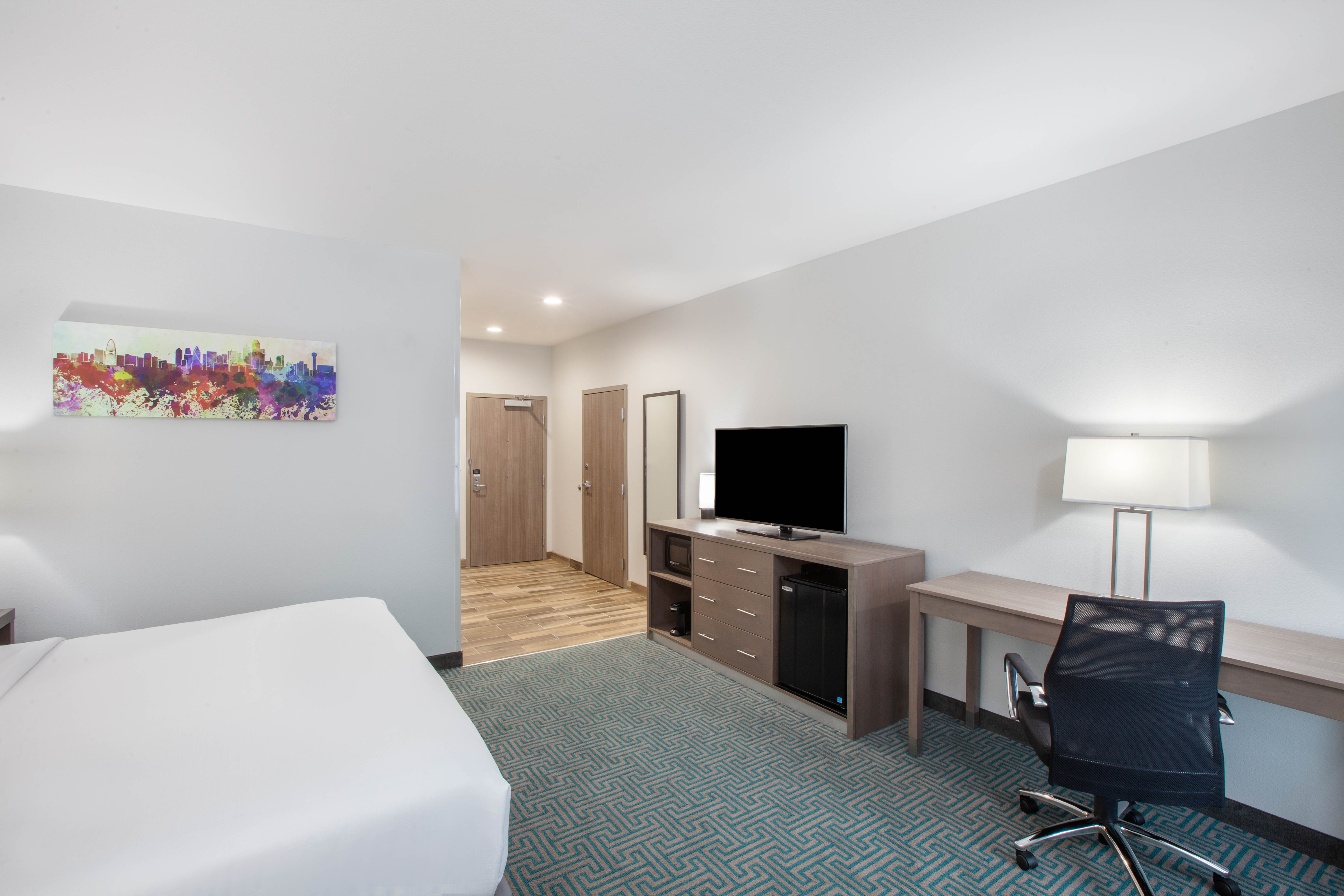 Guest room at the La Quinta Inn & Suites by Wyndham Dallas Duncanville in Duncanville, Texas