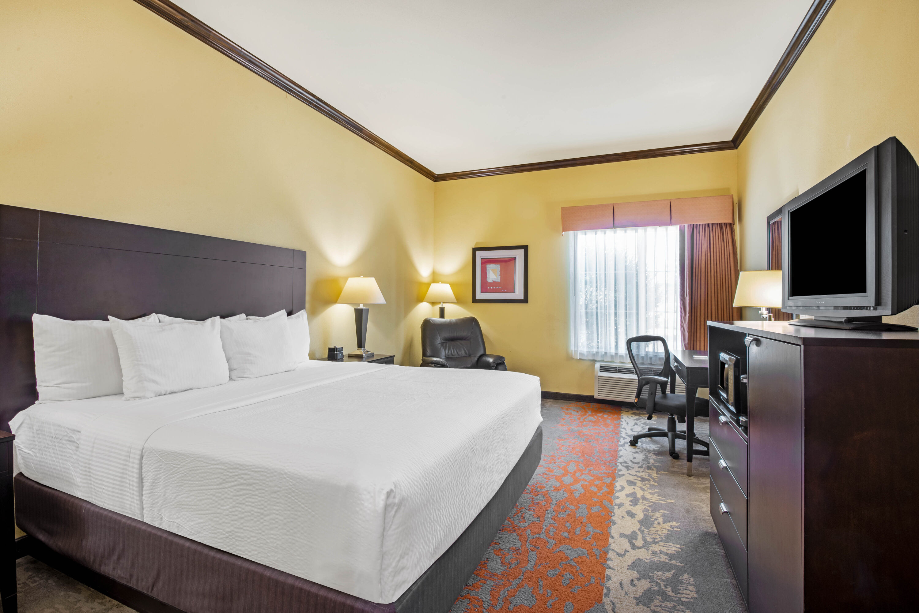 Guest room at the La Quinta Inn & Suites by Wyndham Eastland in Eastland, Texas