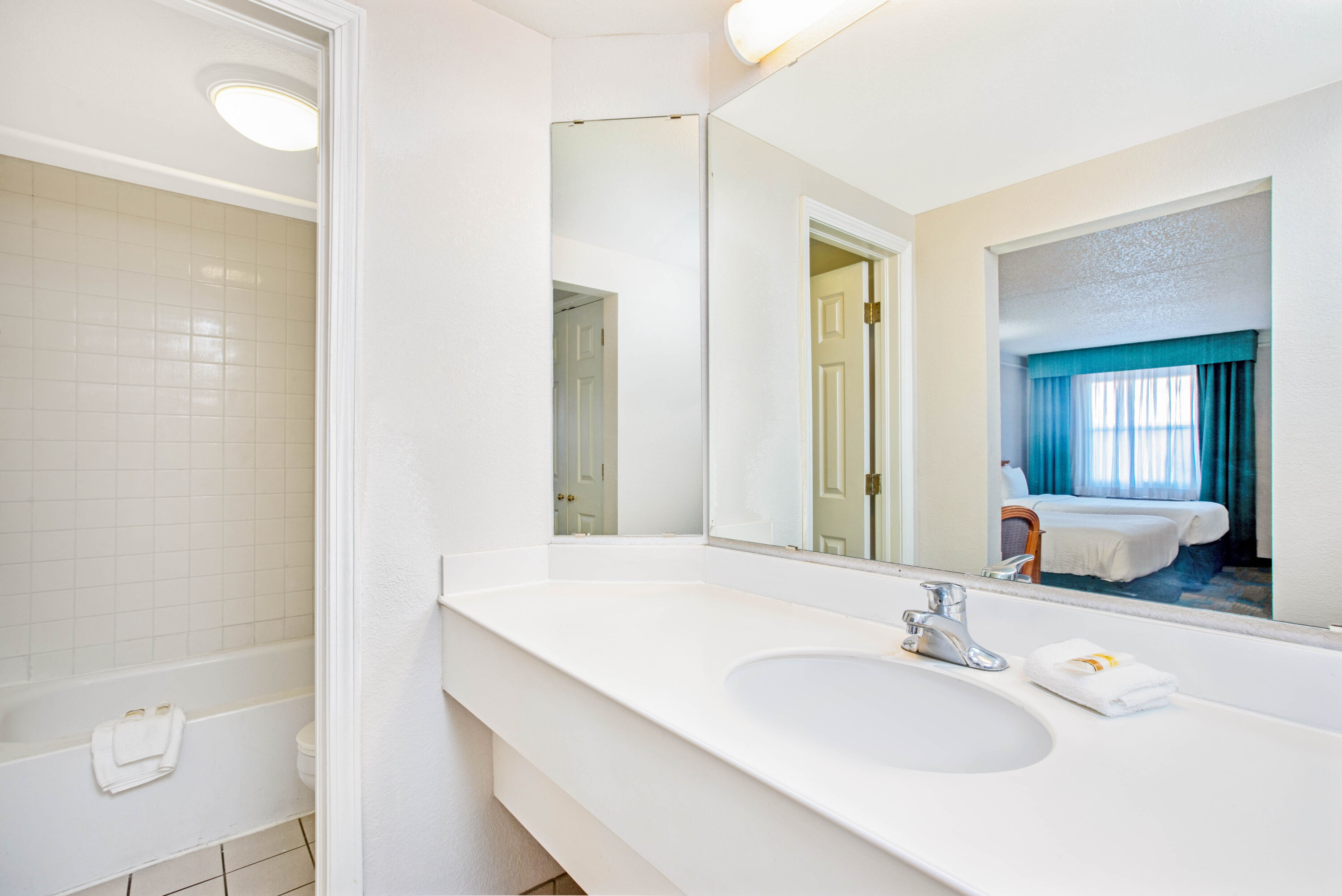 Guest room bath at the La Quinta Inn by Wyndham El Paso Cielo Vista in El Paso, Texas
