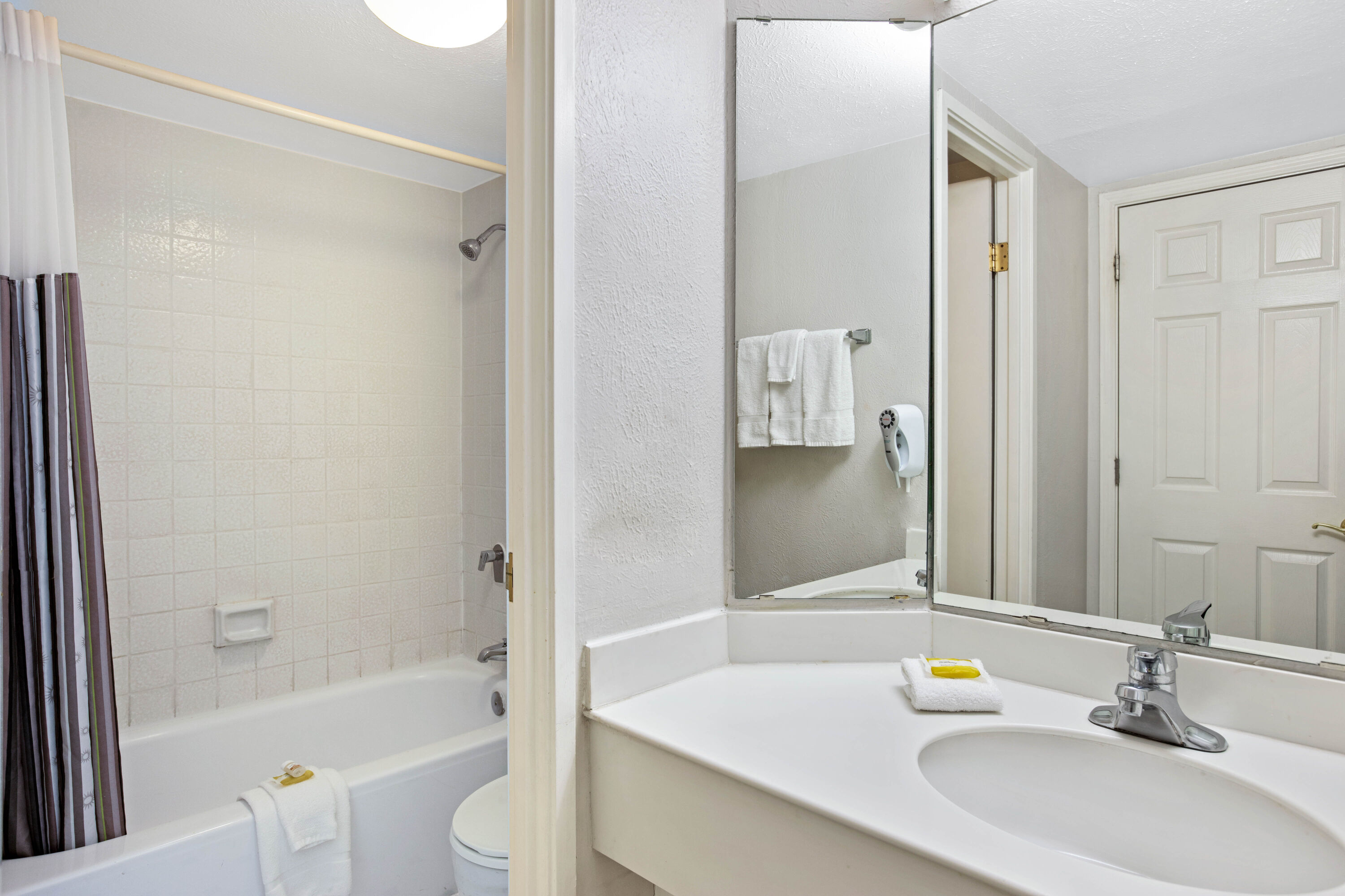 Guest room bath at the La Quinta Inn by Wyndham El Paso East Lomaland in El Paso, Texas