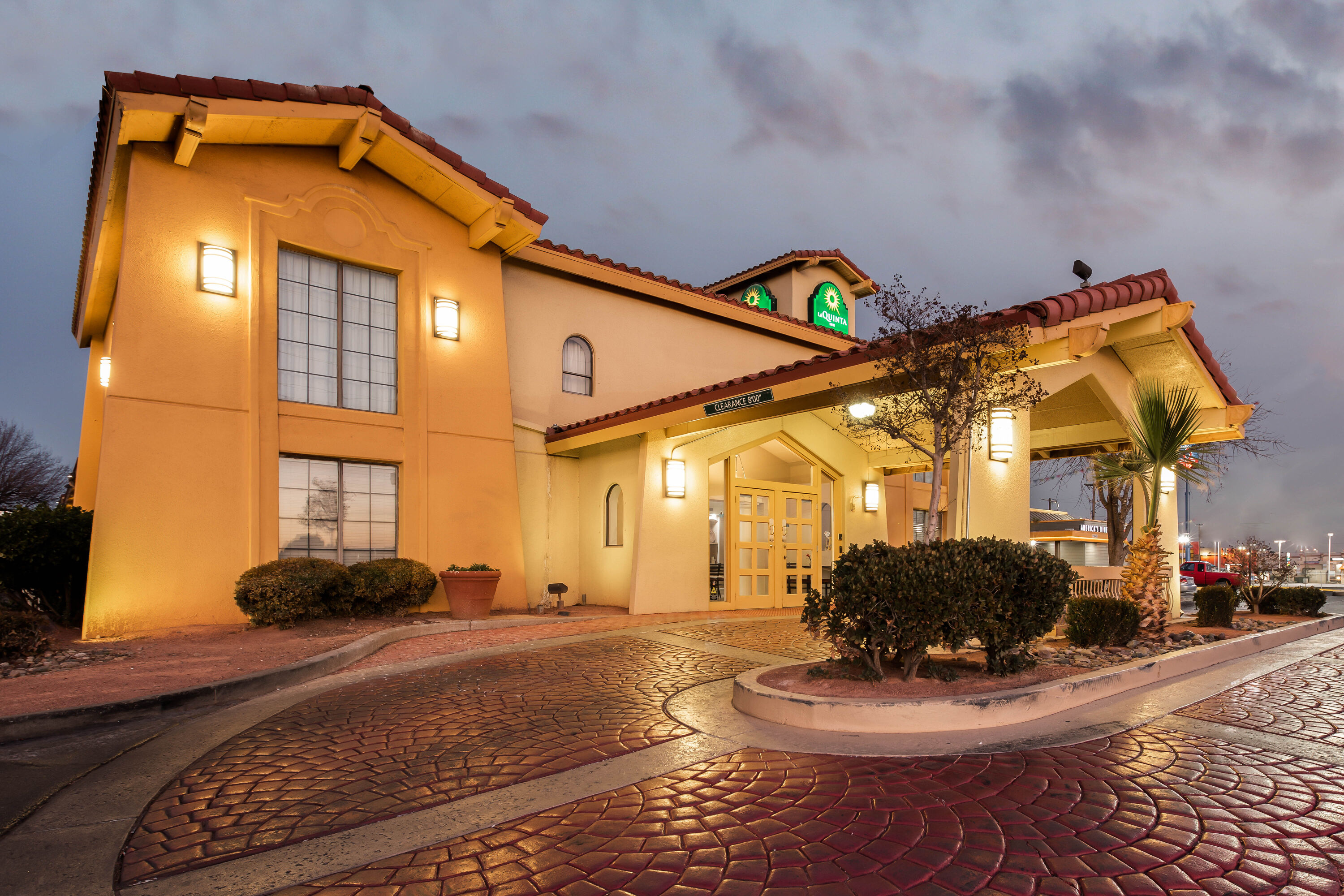 Exterior Dusk Image of La Quinta Inn by Wyndham El Paso East Lomaland hotel in El Paso, Texas