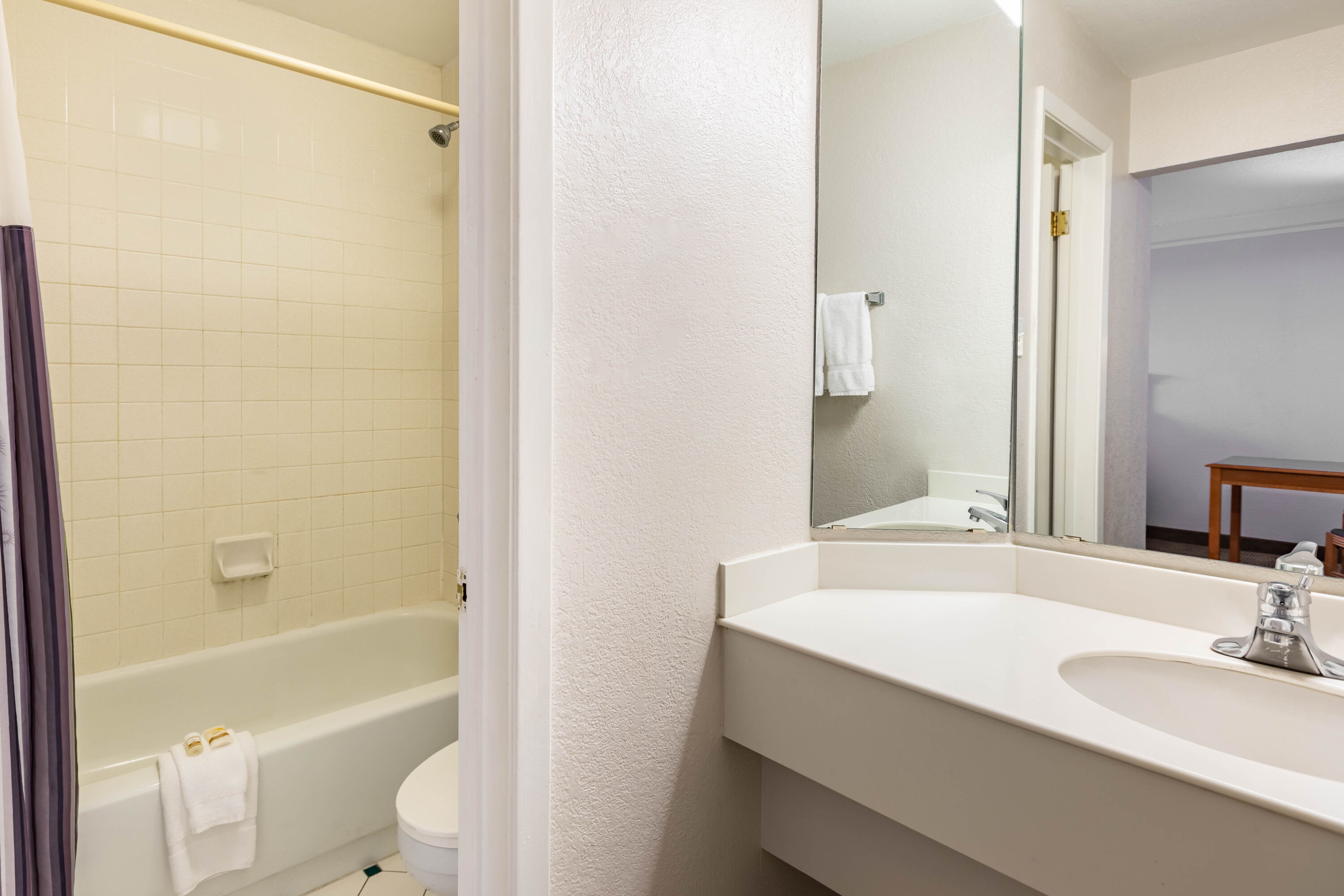 Guest room bath at the La Quinta Inn by Wyndham El Paso West in El Paso, Texas