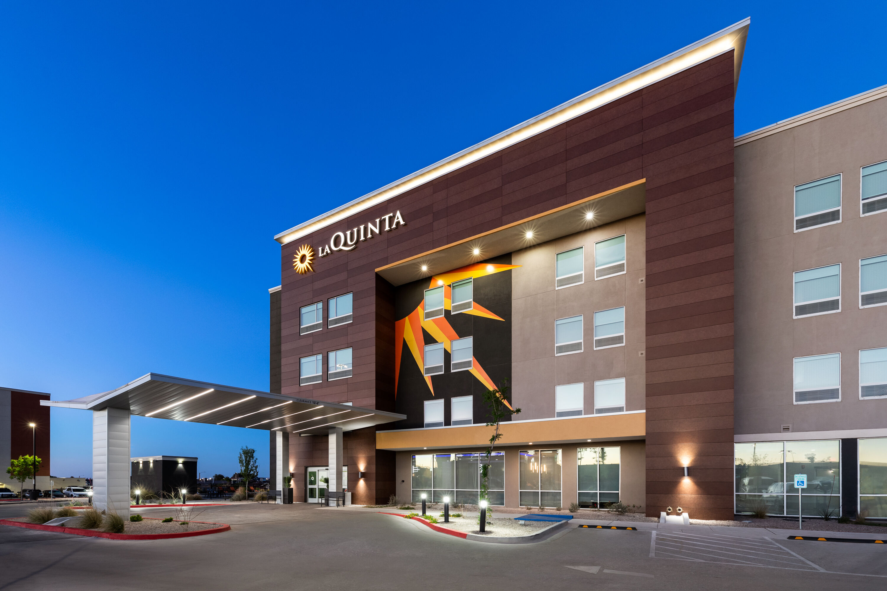 Exterior Dusk Image of La Quinta Inn & Suites by Wyndham El Paso East Loop-375 hotel in El Paso, Texas