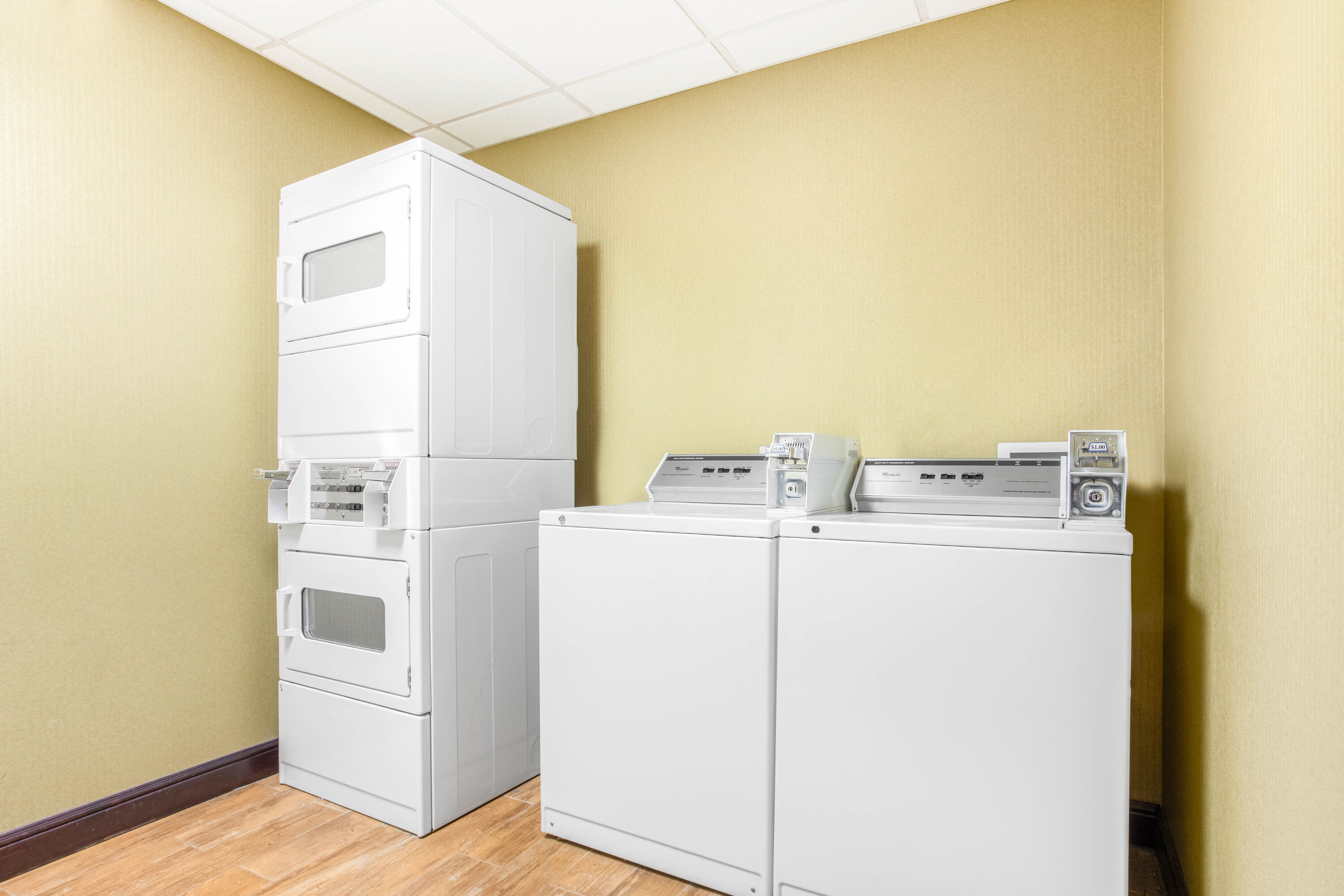 Laundry facilities at La Quinta Inn & Suites by Wyndham Ennis in Ennis, Texas