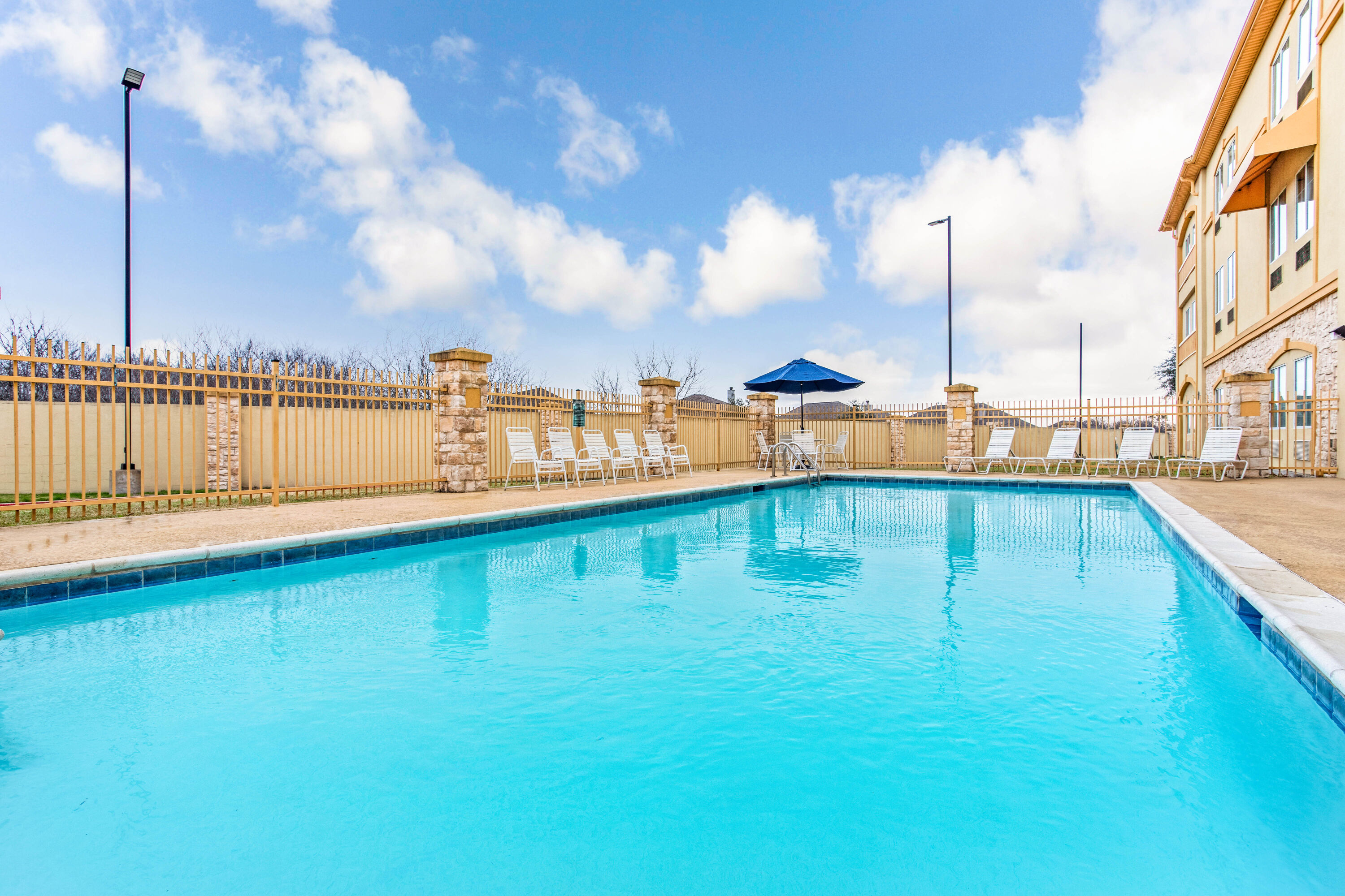 Pool at the La Quinta Inn & Suites by Wyndham Ennis in Ennis, Texas