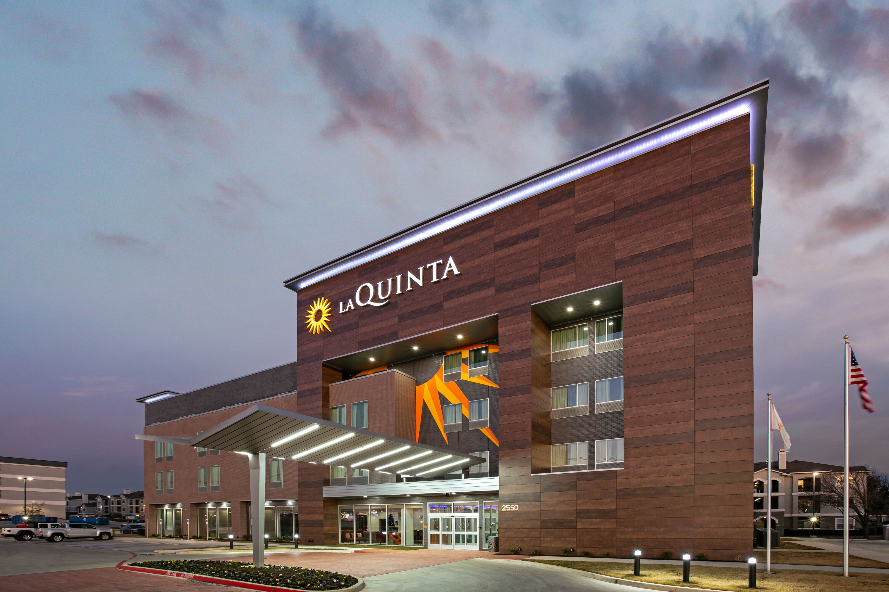 Exterior Dusk Image of La Quinta Inn & Suites by Wyndham DFW West-Glade Parks hotel in Euless, Texas