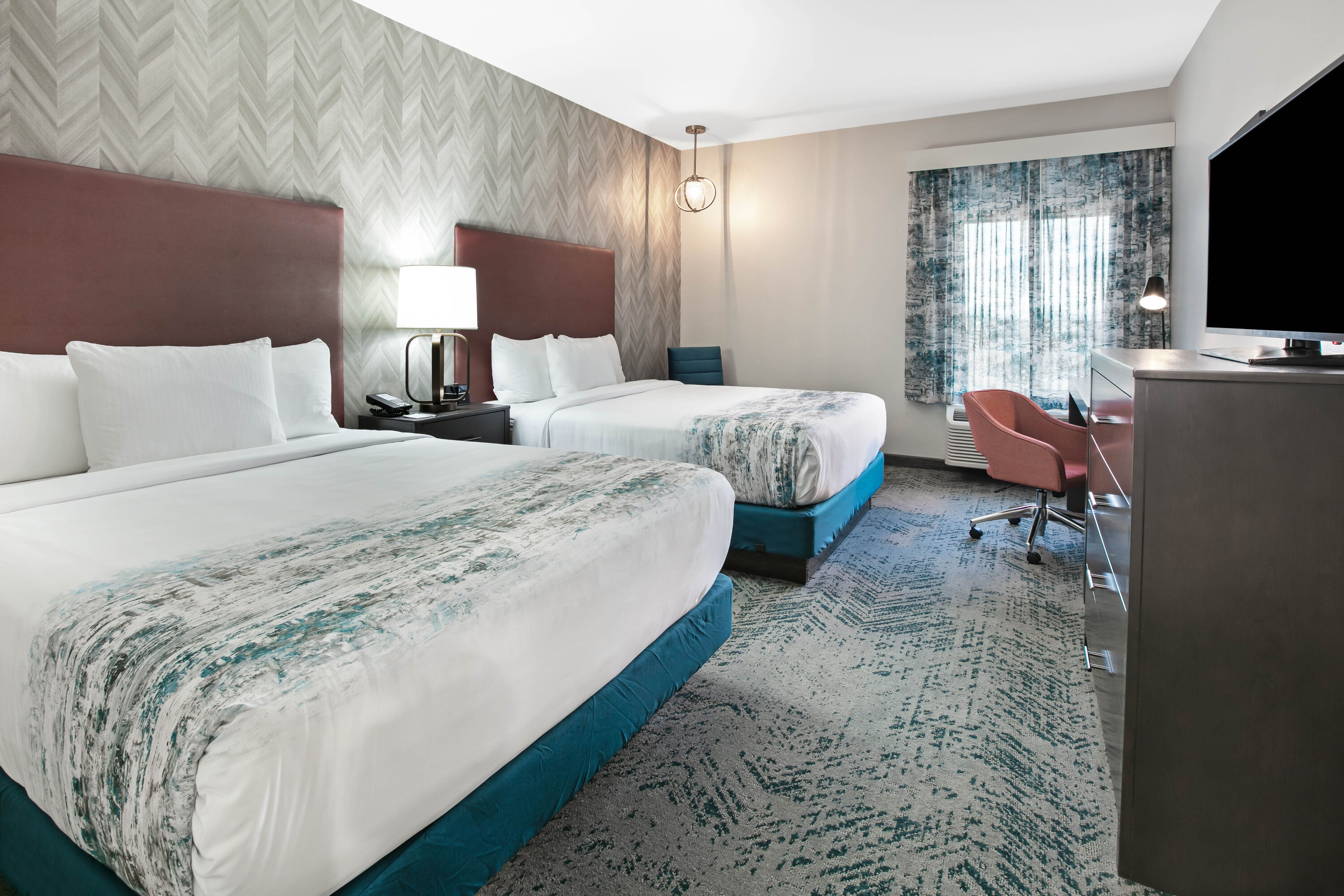 Guest room at the La Quinta Inn & Suites by Wyndham DFW West-Glade Parks in Euless, Texas