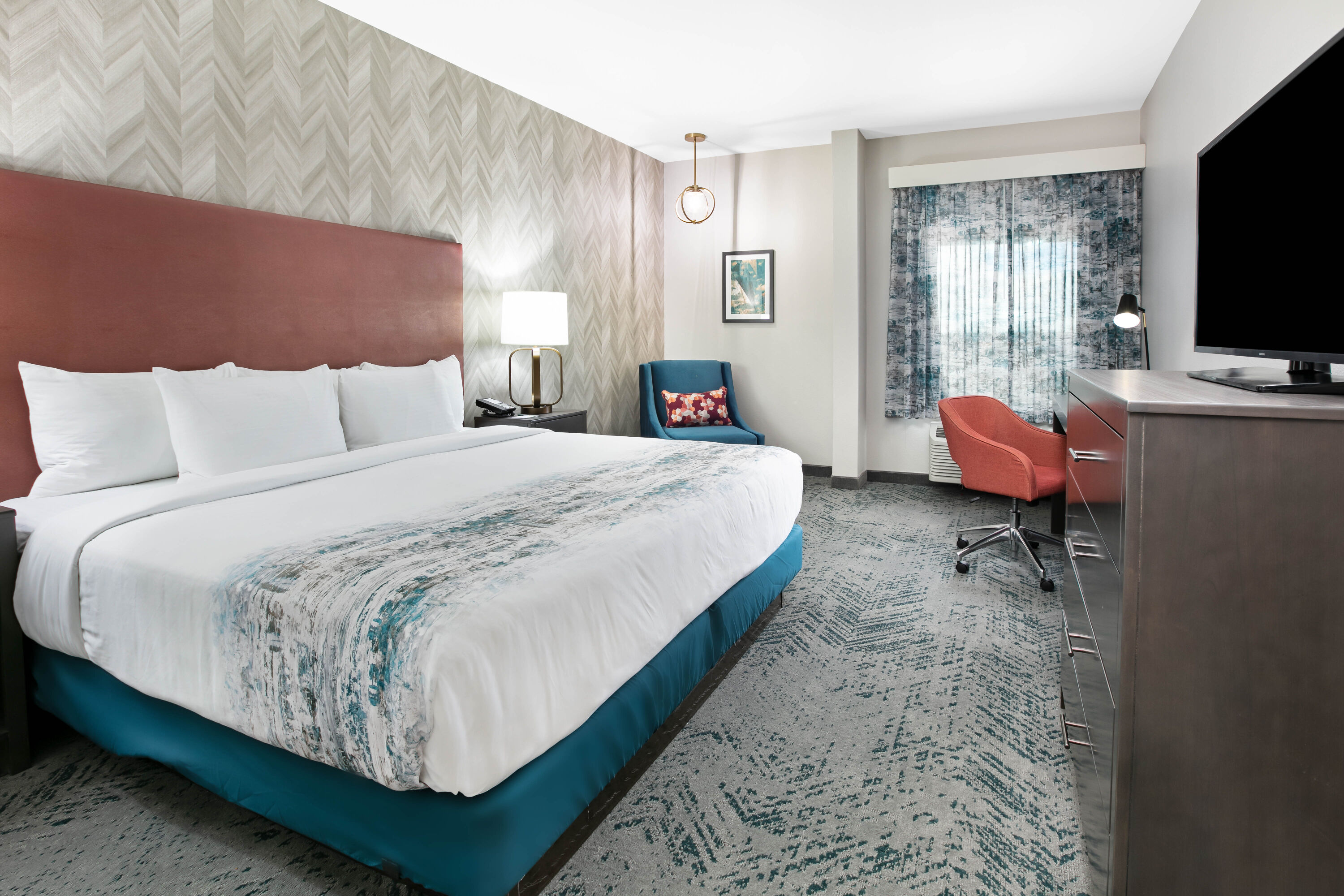 Guest room at the La Quinta Inn & Suites by Wyndham DFW West-Glade Parks in Euless, Texas