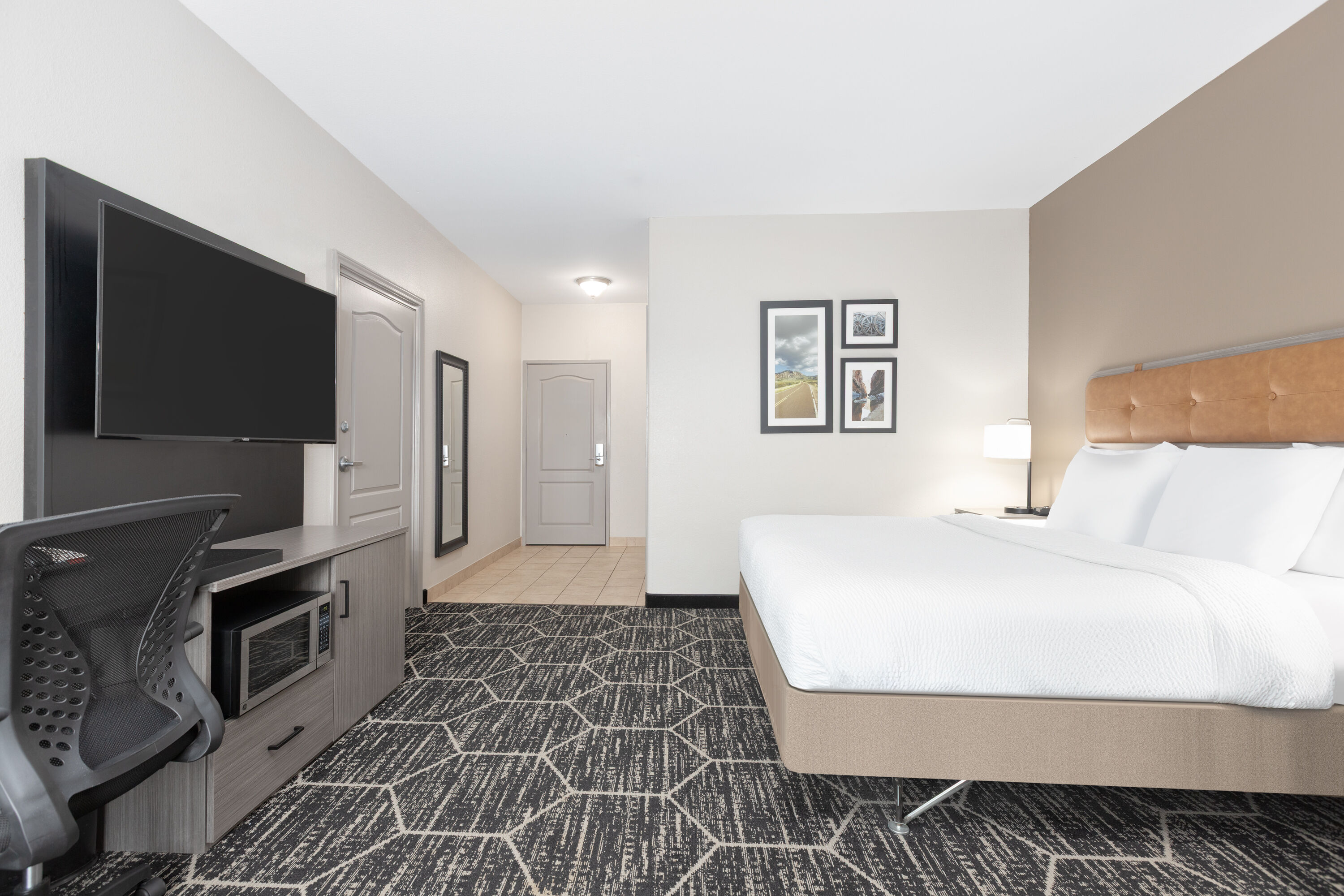 Guest room at the La Quinta Inn & Suites by Wyndham Fairfield TX in Fairfield, Texas