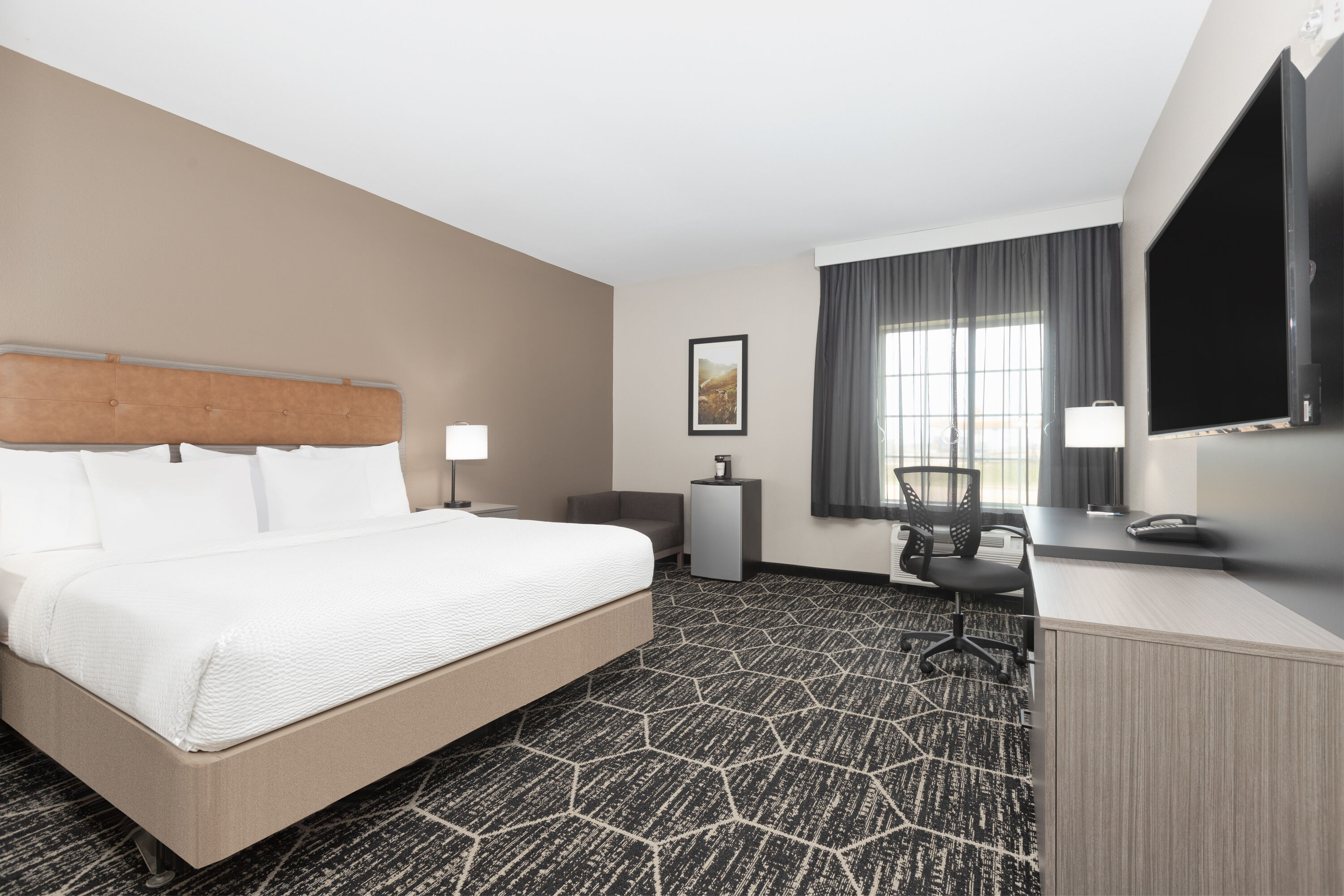 Guest room at the La Quinta Inn & Suites by Wyndham Fairfield TX in Fairfield, Texas