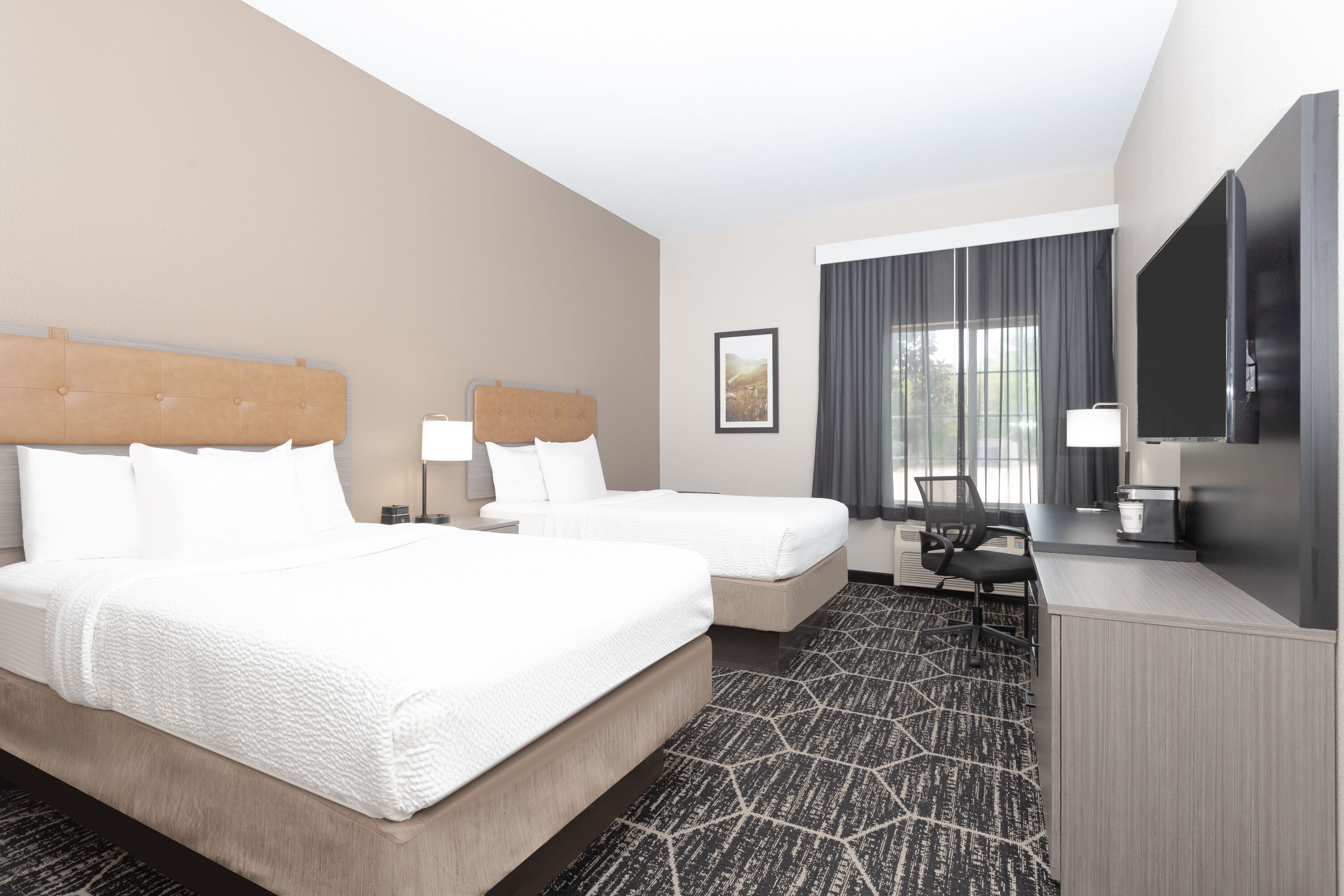 Guest room at the La Quinta Inn & Suites by Wyndham Fairfield TX in Fairfield, Texas