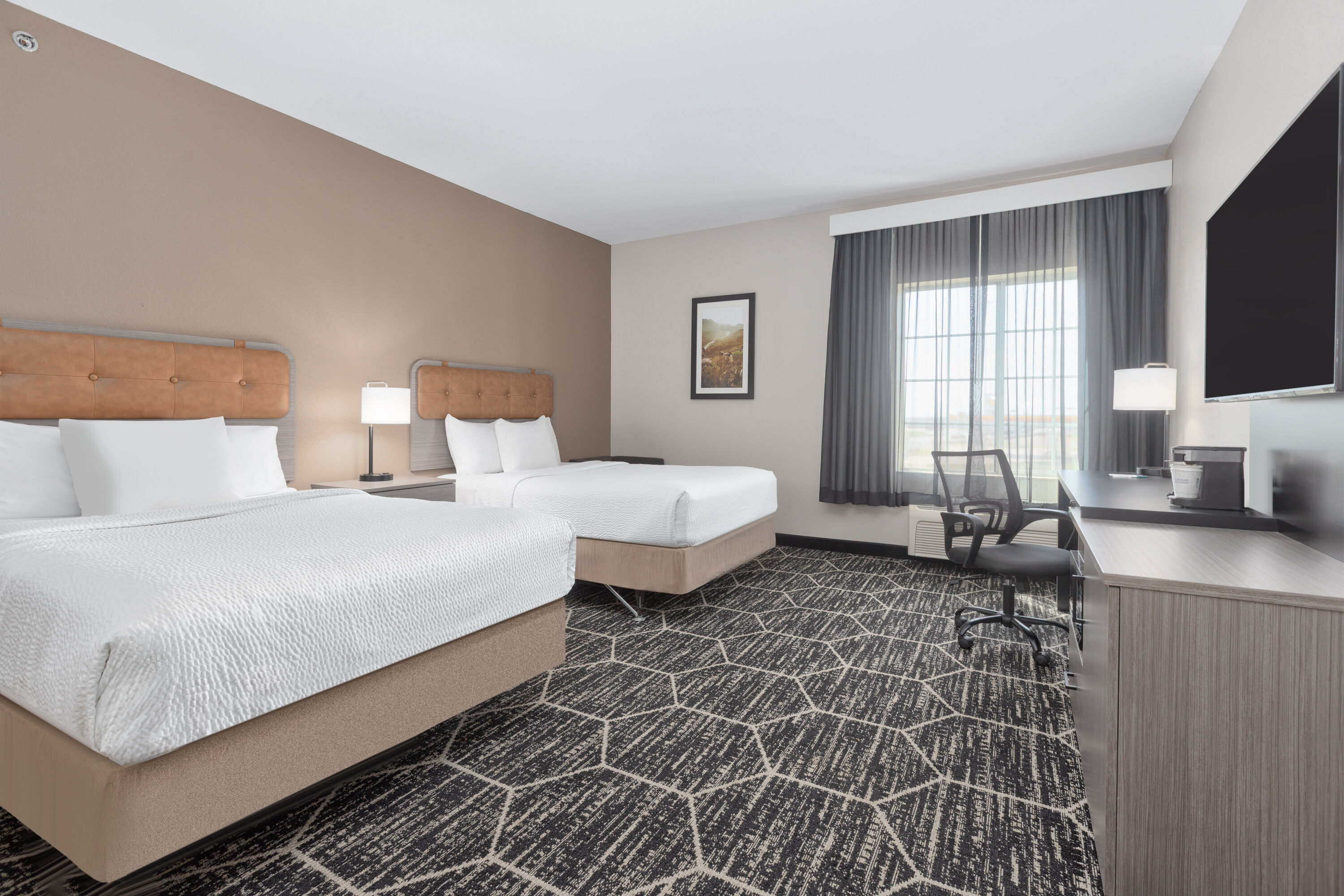 Guest room at the La Quinta Inn & Suites by Wyndham Fairfield TX in Fairfield, Texas