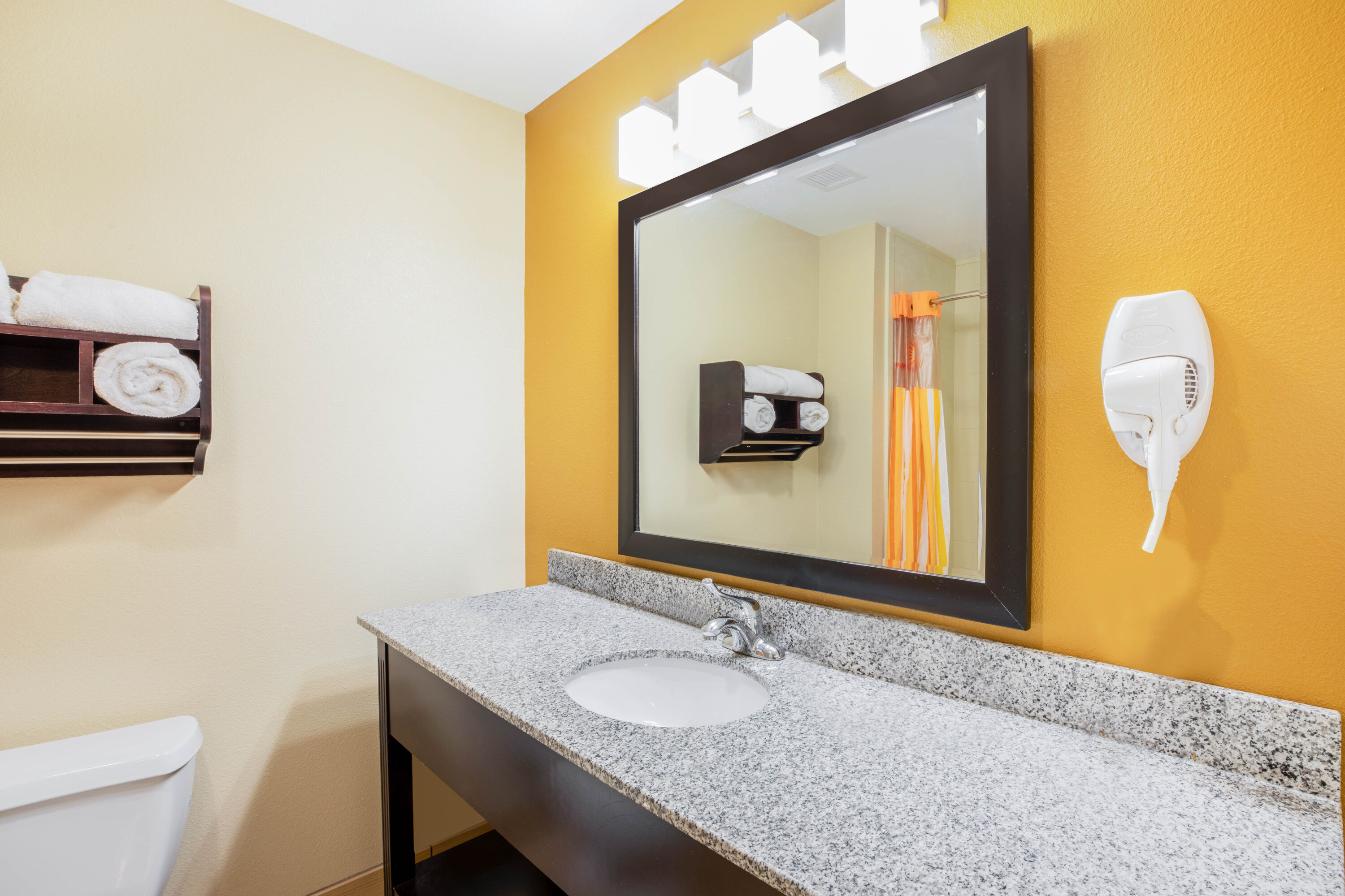 Guest room bath at the La Quinta Inn & Suites by Wyndham Floresville in Floresville, Texas