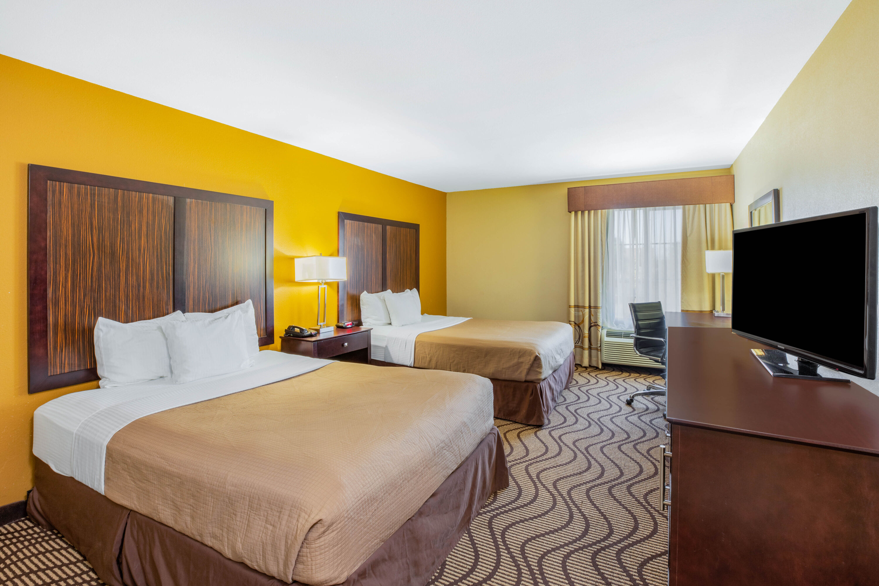 Guest room at the La Quinta Inn & Suites by Wyndham Floresville in Floresville, Texas