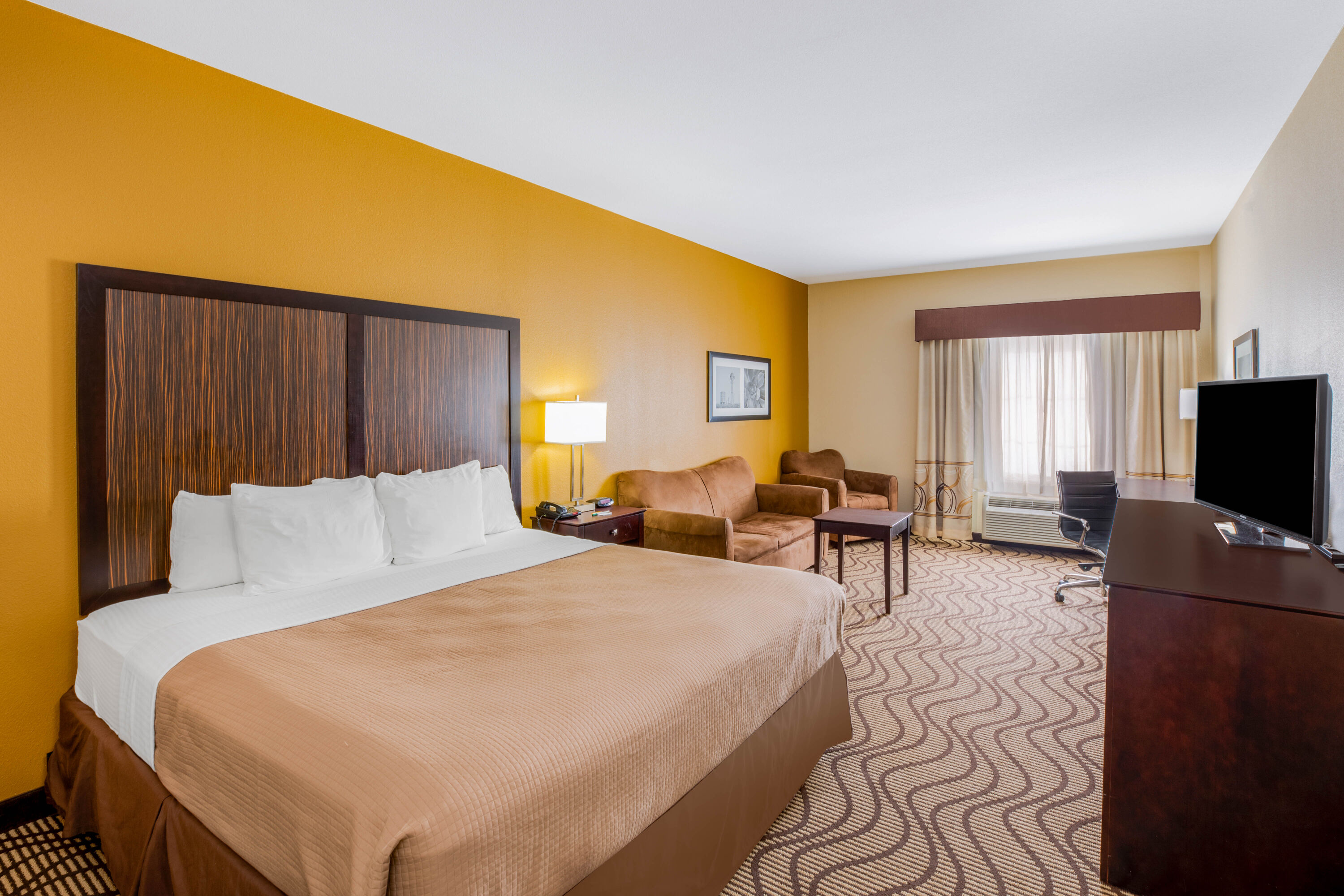 Guest room at the La Quinta Inn & Suites by Wyndham Floresville in Floresville, Texas