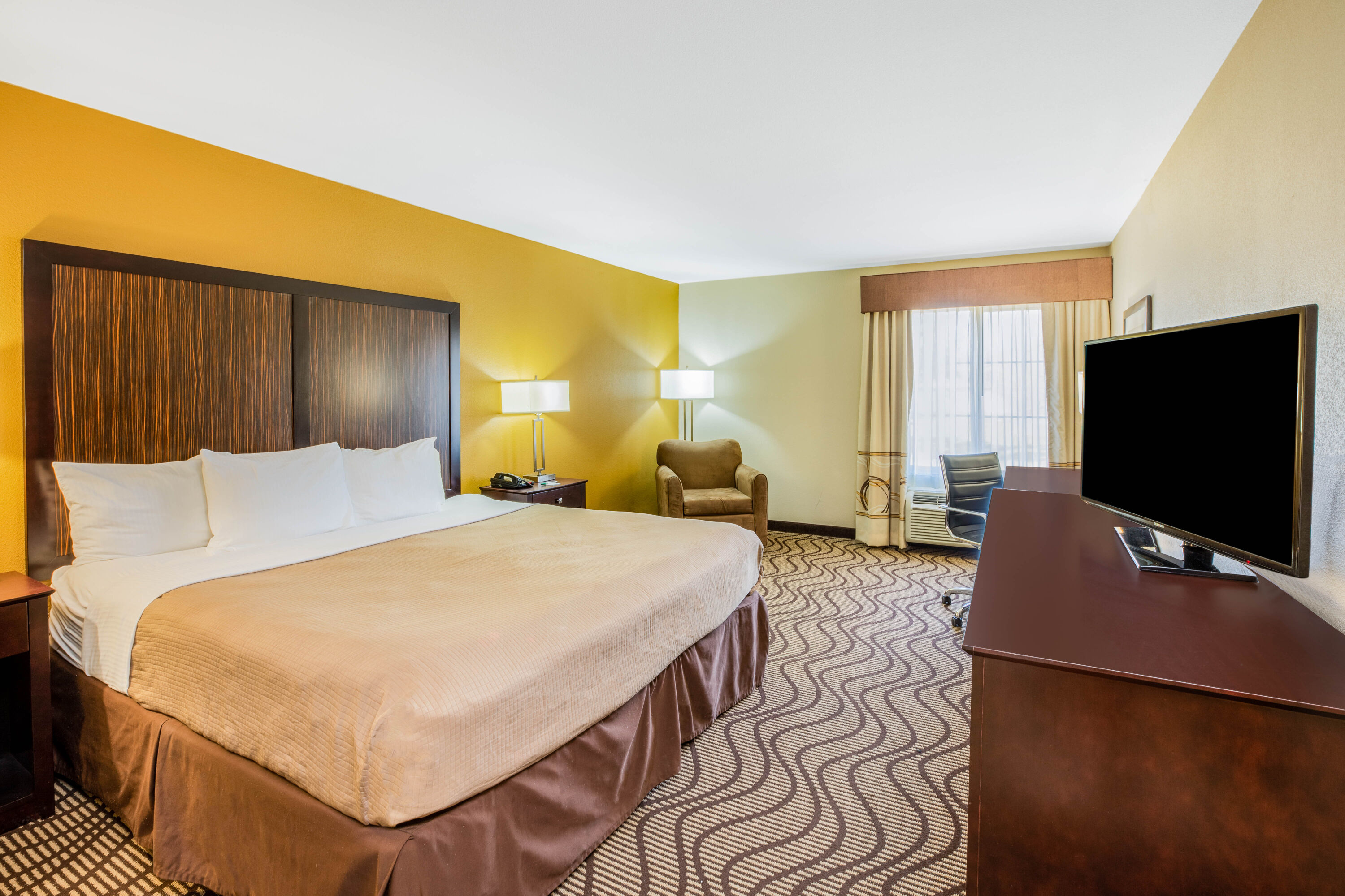Guest room at the La Quinta Inn & Suites by Wyndham Floresville in Floresville, Texas