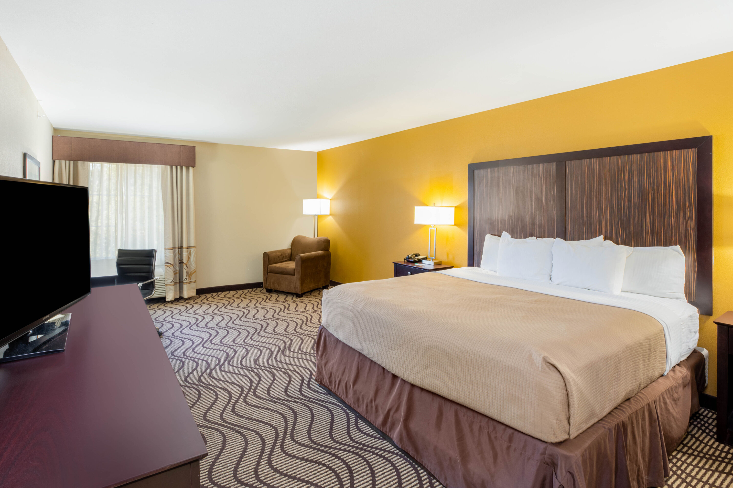 Guest room at the La Quinta Inn & Suites by Wyndham Floresville in Floresville, Texas