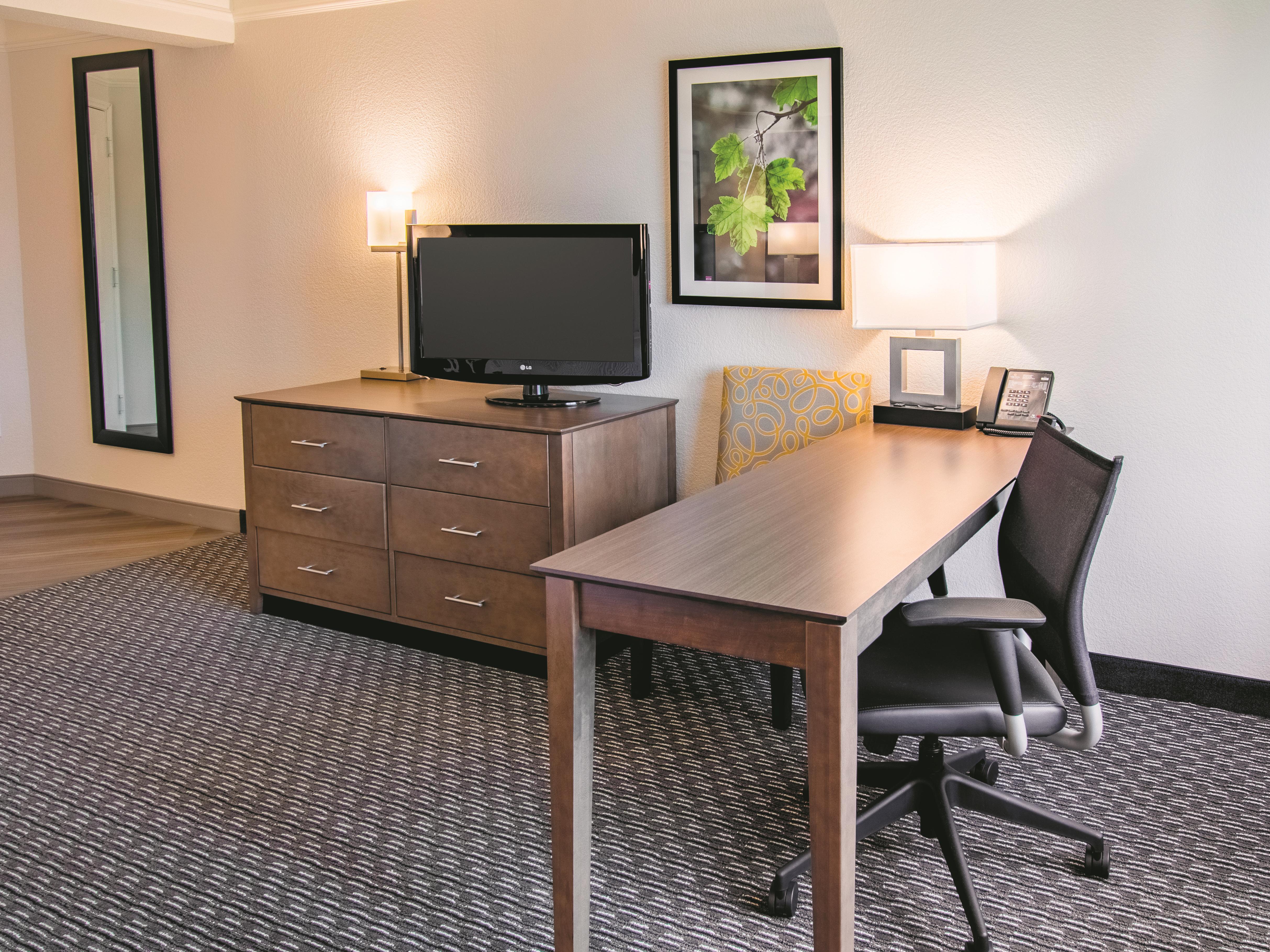 Guest room at the La Quinta Inn & Suites by Wyndham Fort Worth City View in Fort Worth, Texas