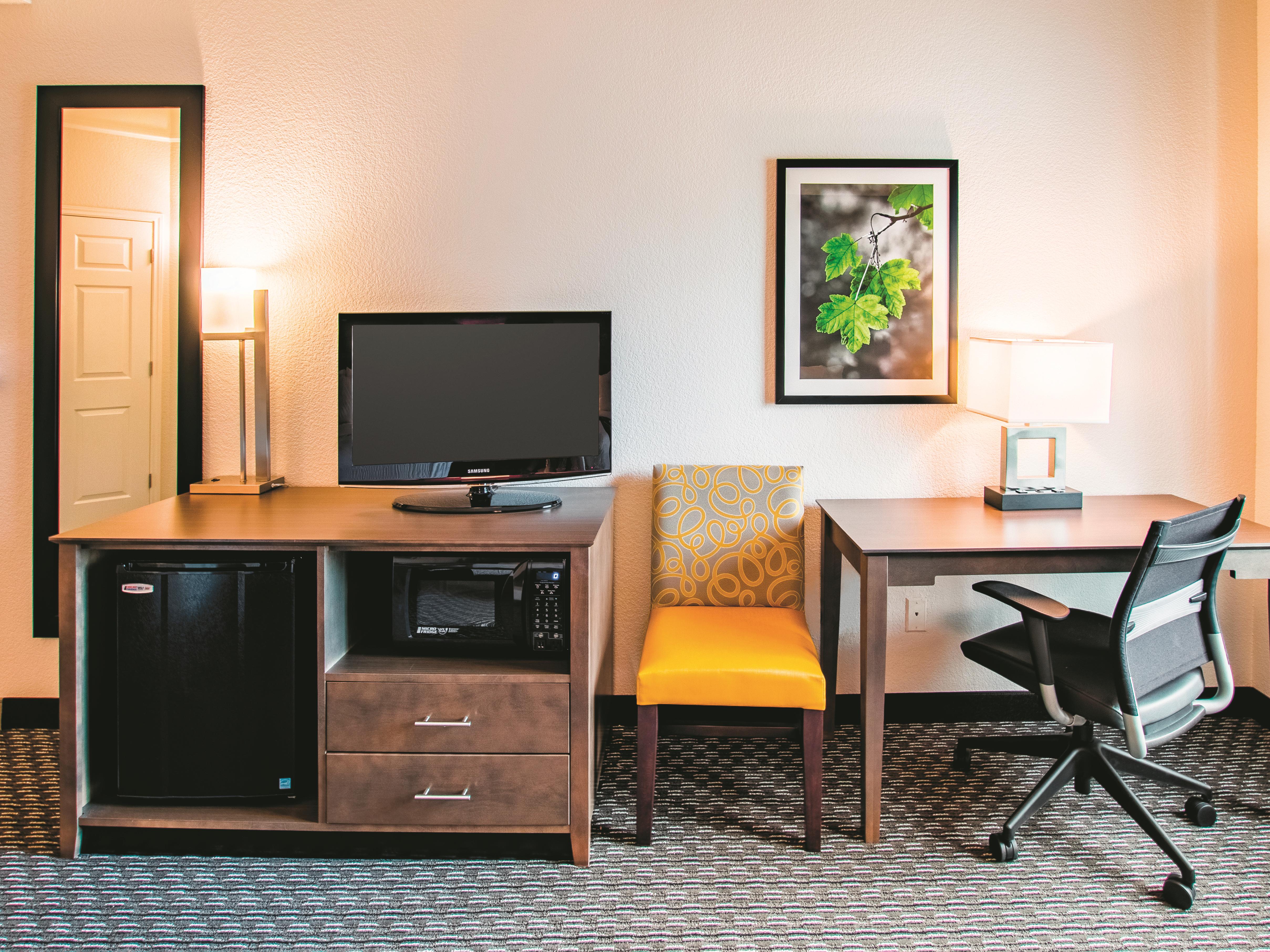 Guest room at the La Quinta Inn & Suites by Wyndham Fort Worth City View in Fort Worth, Texas