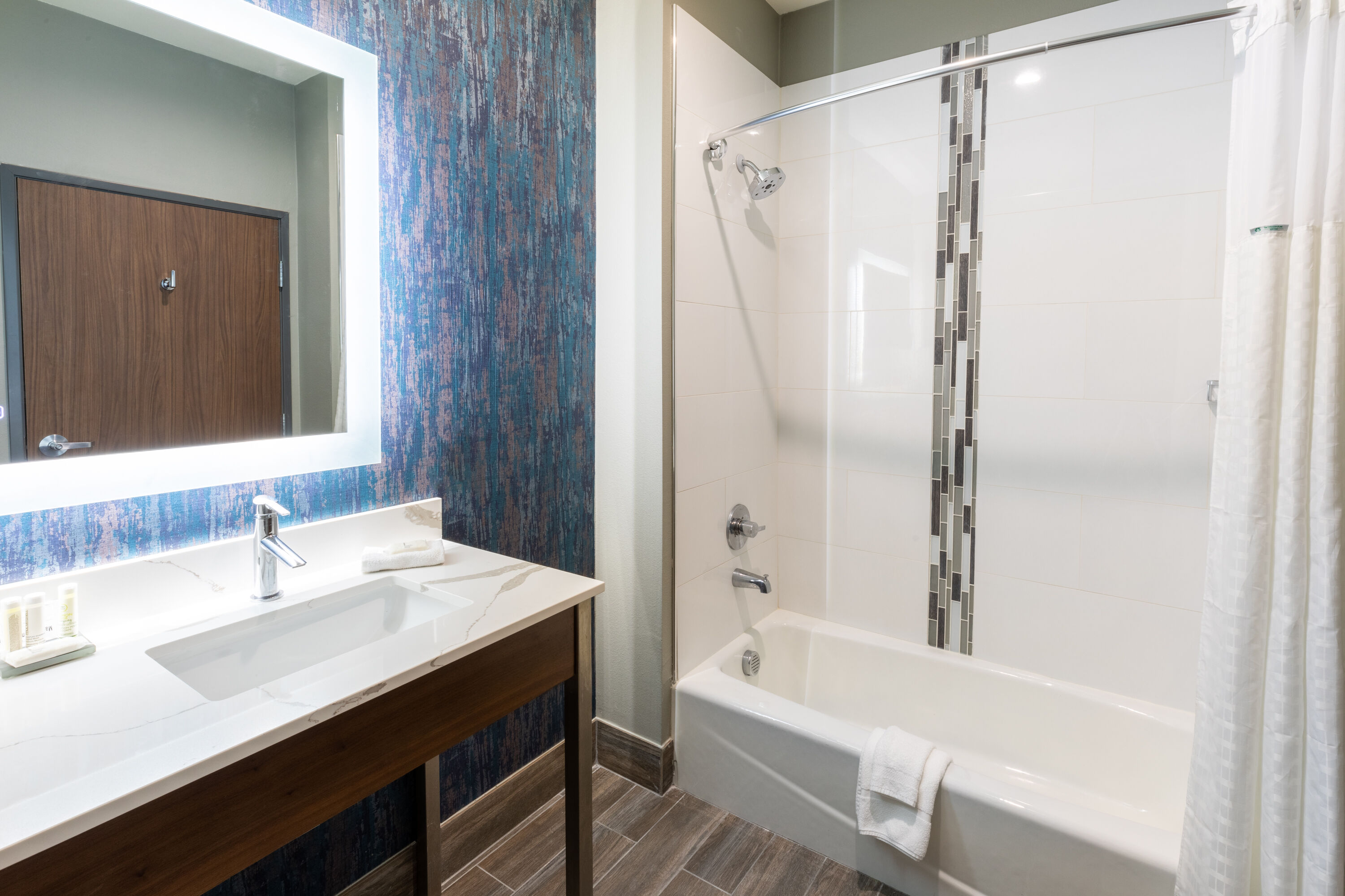 Guest room bath at the La Quinta Inn & Suites by Wyndham Dallas - Frisco Stadium in Frisco, Texas